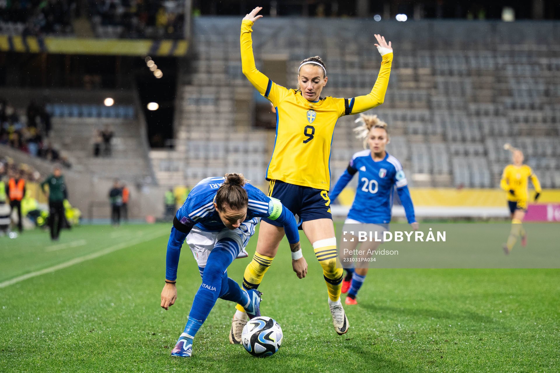 Elena Linari of Italy and Kosovare Asllani of Sweden