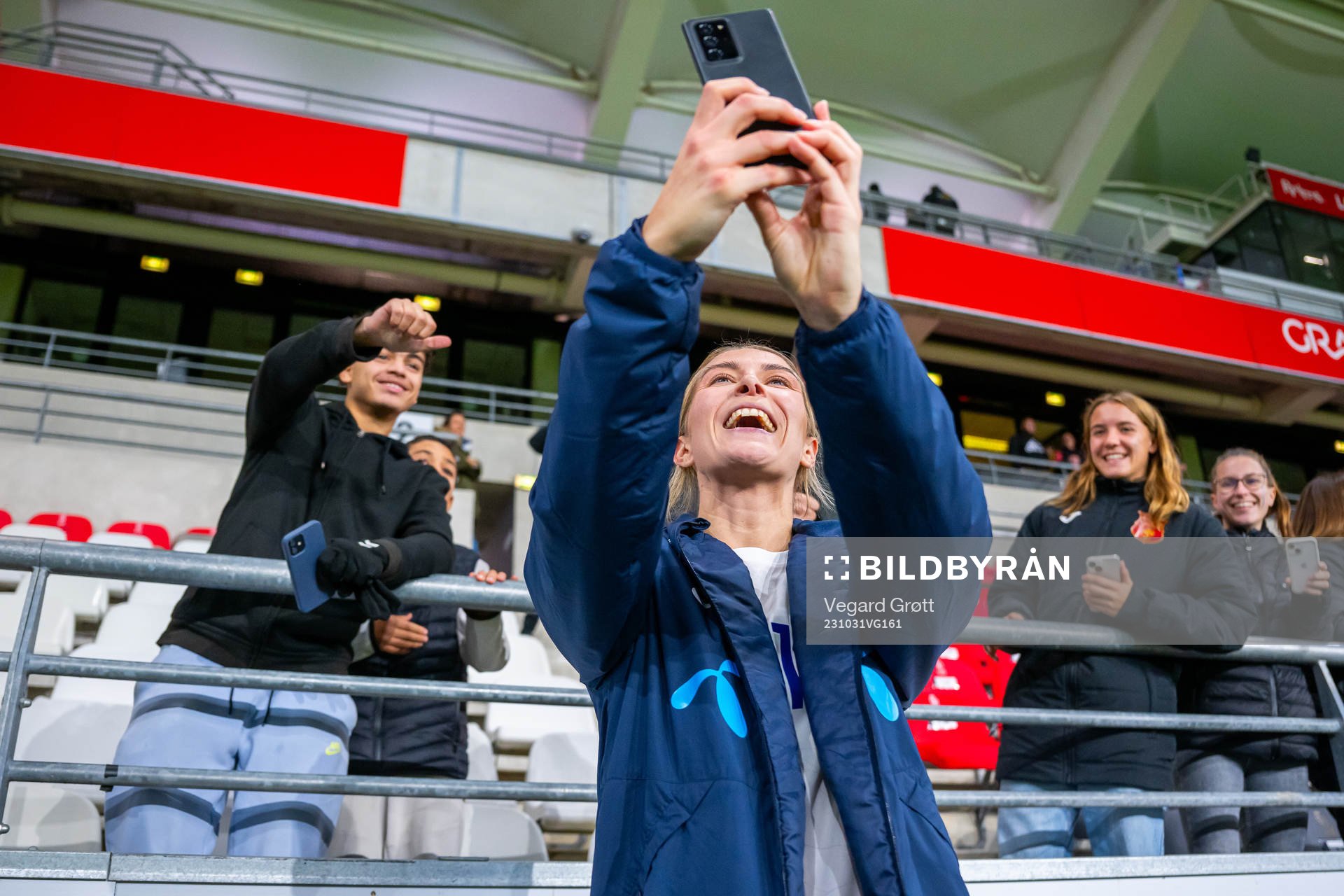 Mimmi Löfwenius of Norway takes a selfie with fans