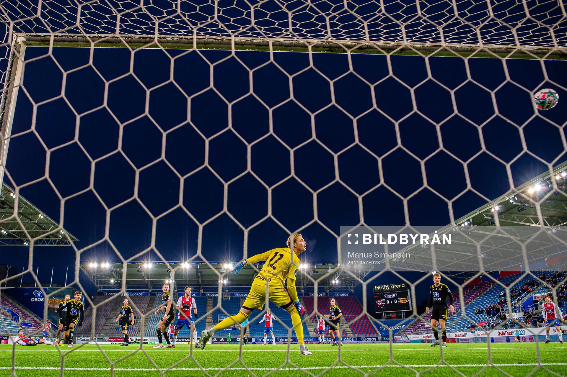 Remi-André Svindland of KFUM scores the 1-0 goal behind goalkeeper Lars Martin Kvarekvål of Skeid during the OBOS-ligaen match between KFUM and Skeid on November 5, 2023 in Oslo.