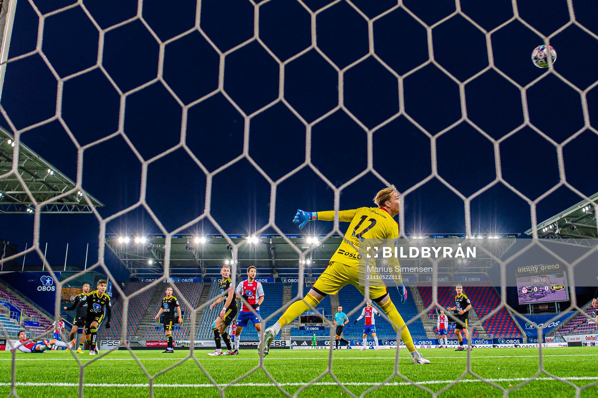 Remi-André Svindland of KFUM scores the 1-0 goal behind
