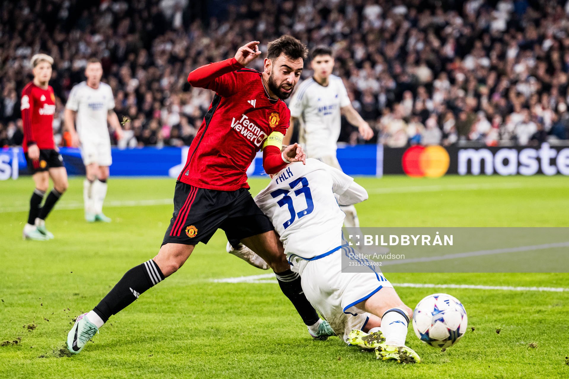 Bruno Fernandes of Manchester United and Rasmus Falk of FC