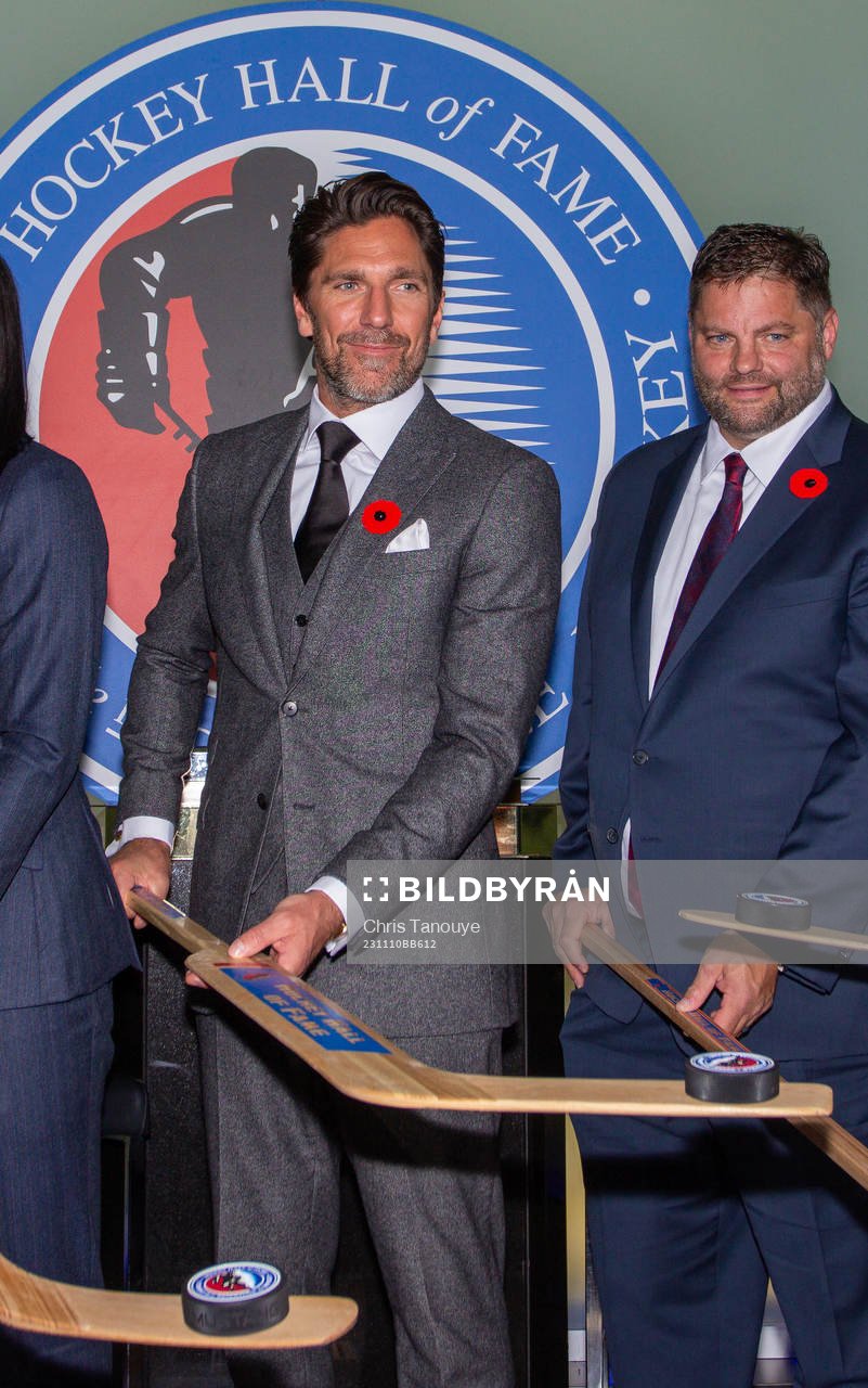 Henrik Lundqvist flips a puck