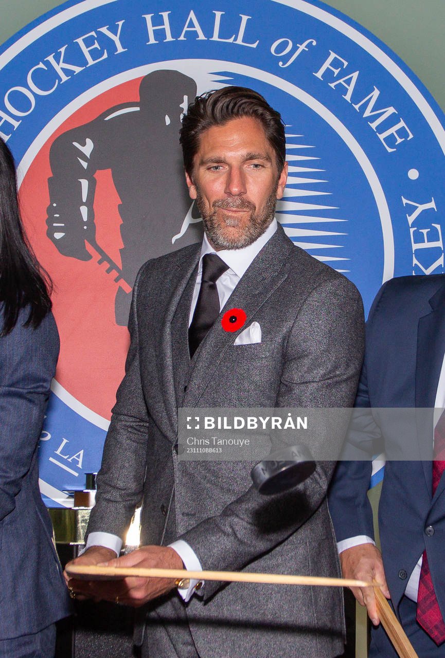 Henrik Lundqvist flips a puck
