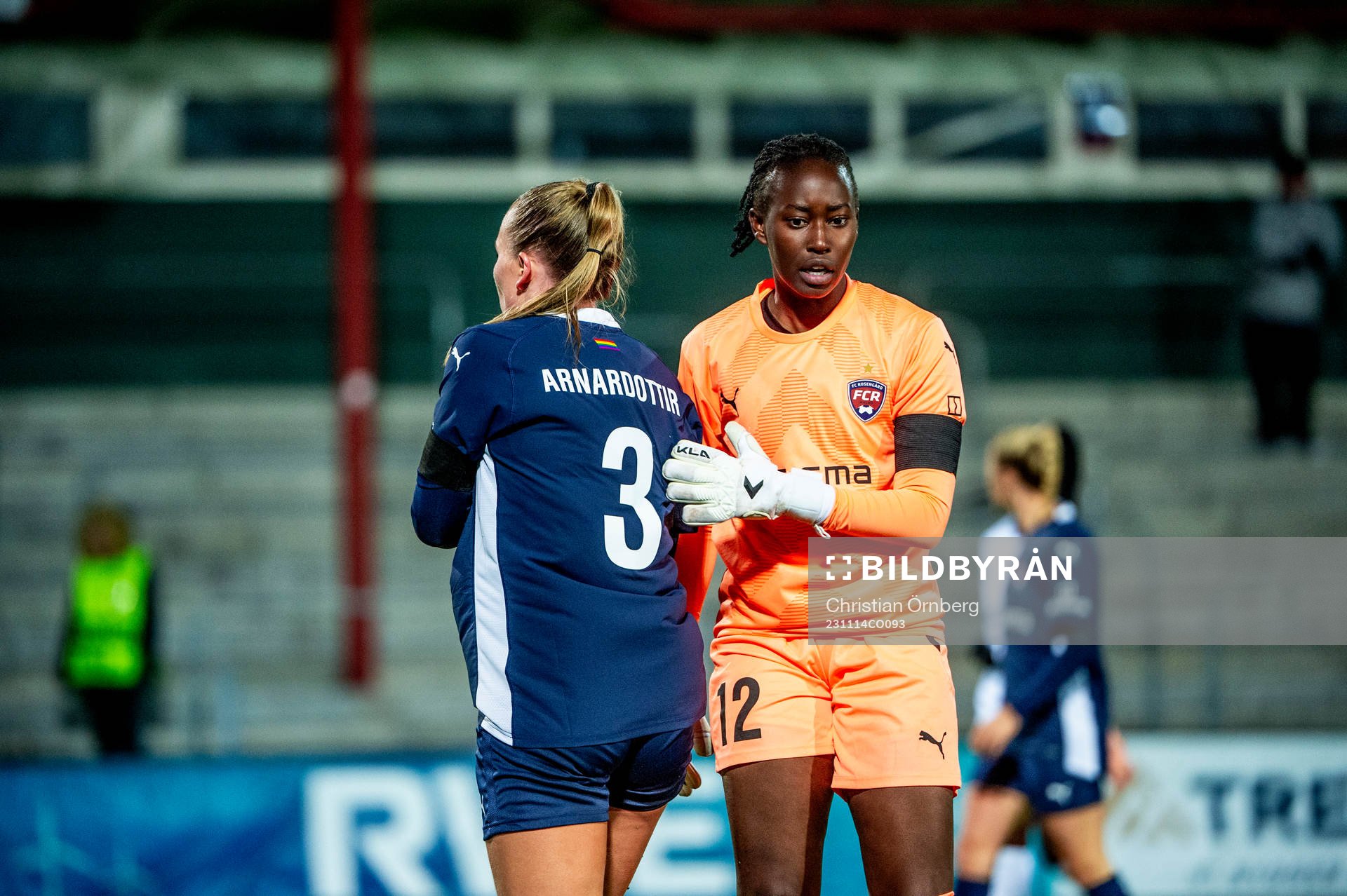 Gudrun Arnardottir and goalkeeper Angel Mukasa of FC