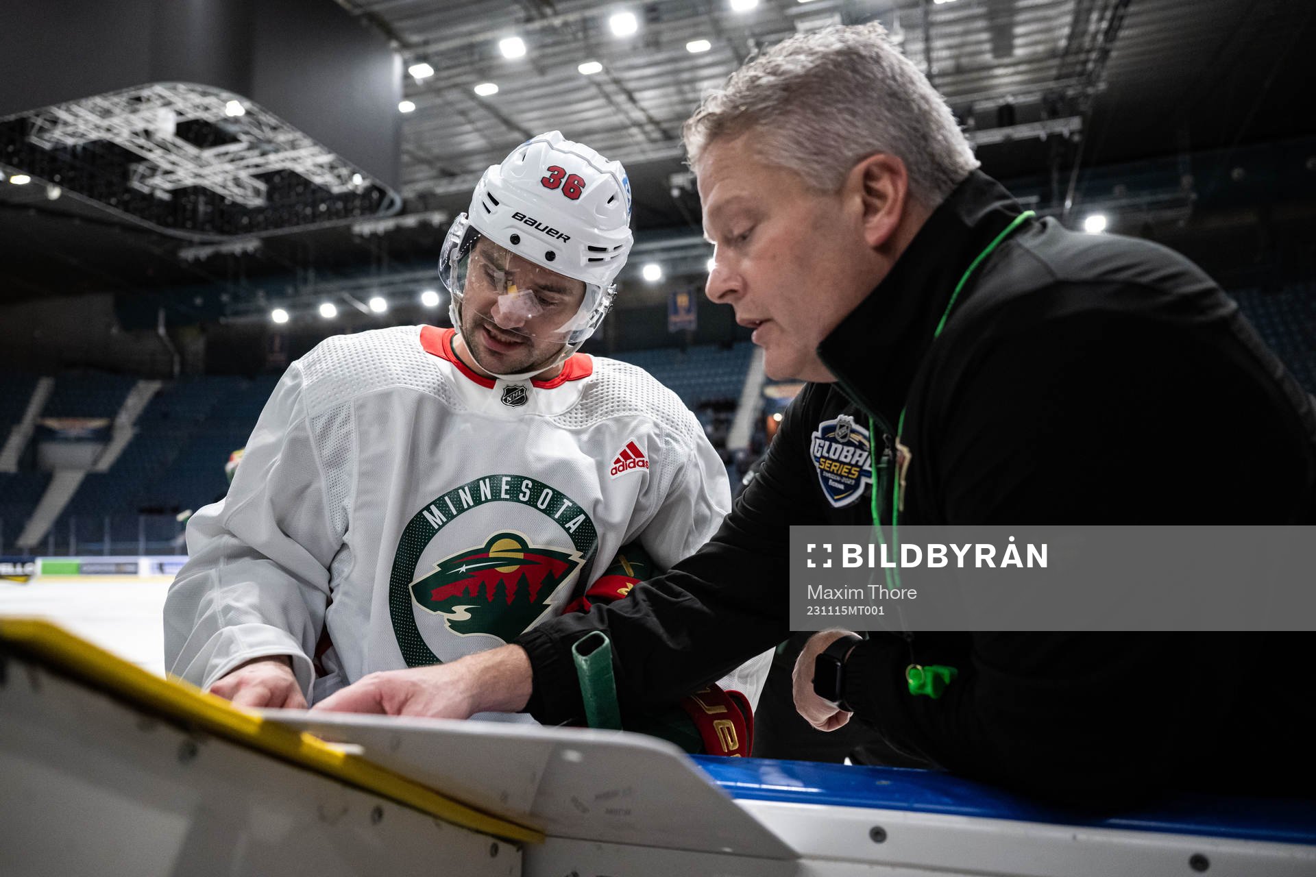 Mats Zuccarello and assistant coach Bob Woods of the