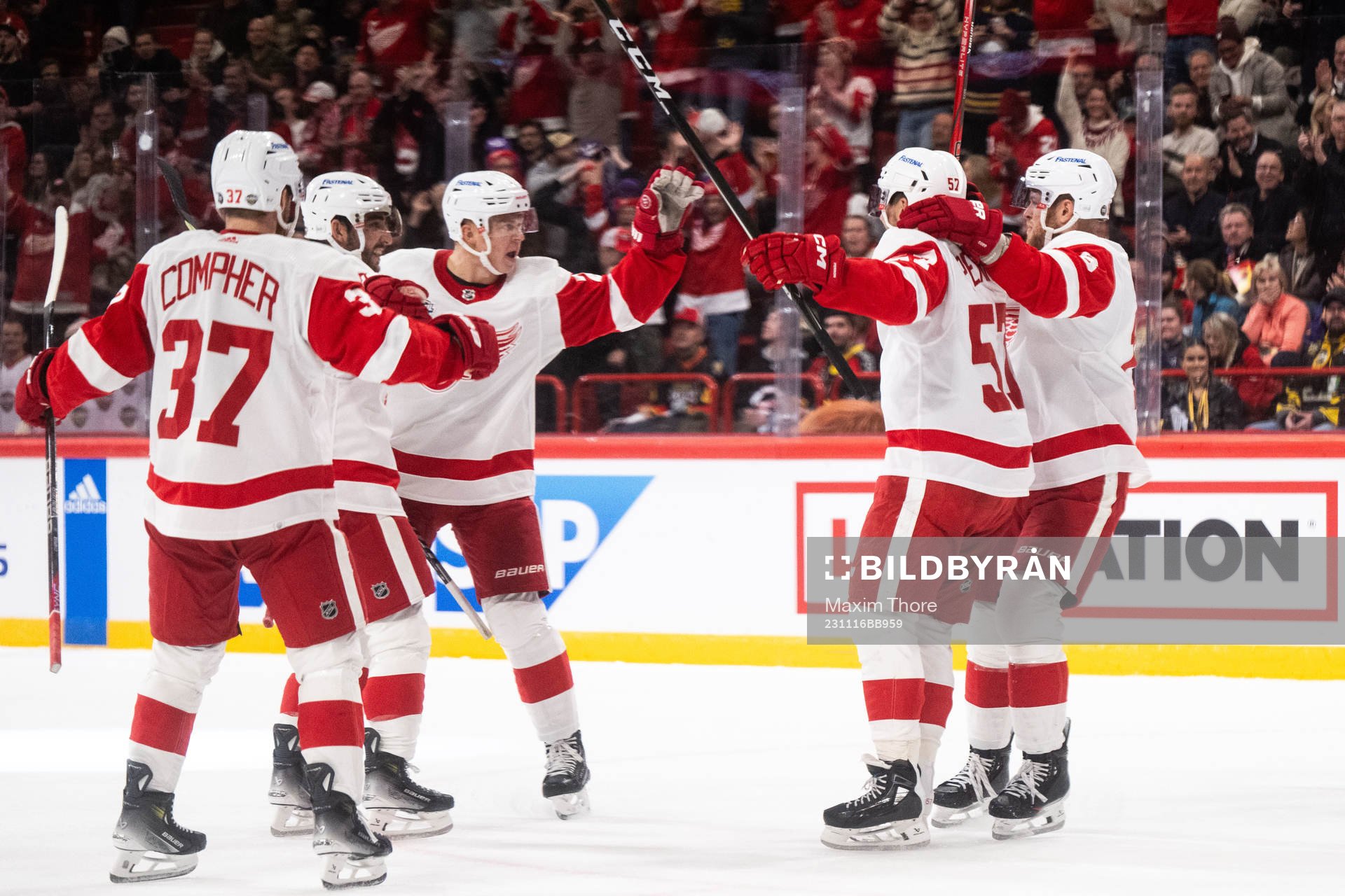David Perron of Detroit Red Wings celebrates with team mates
