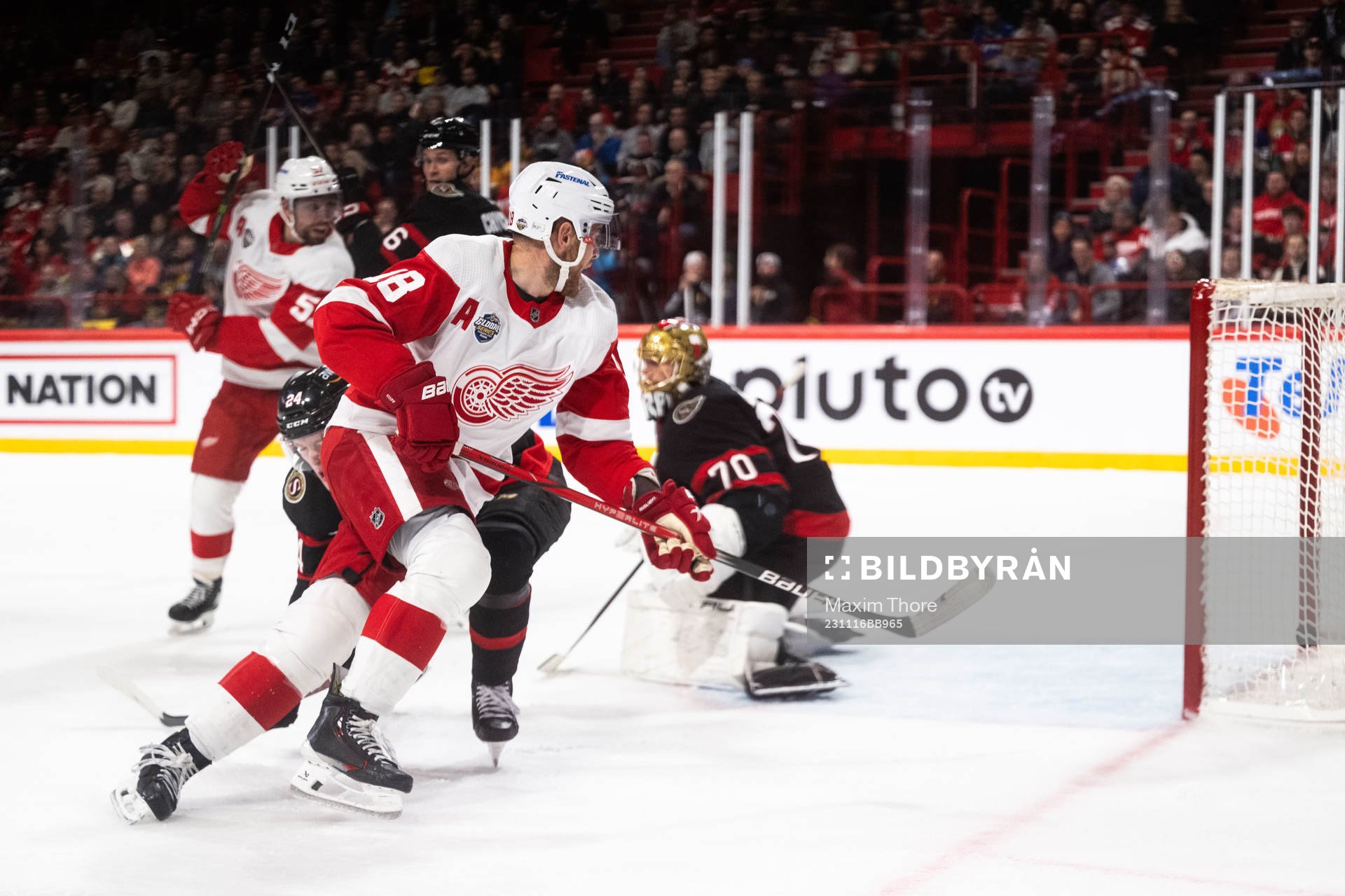 Andrew Copp of Detroit Red Wings watches the puck