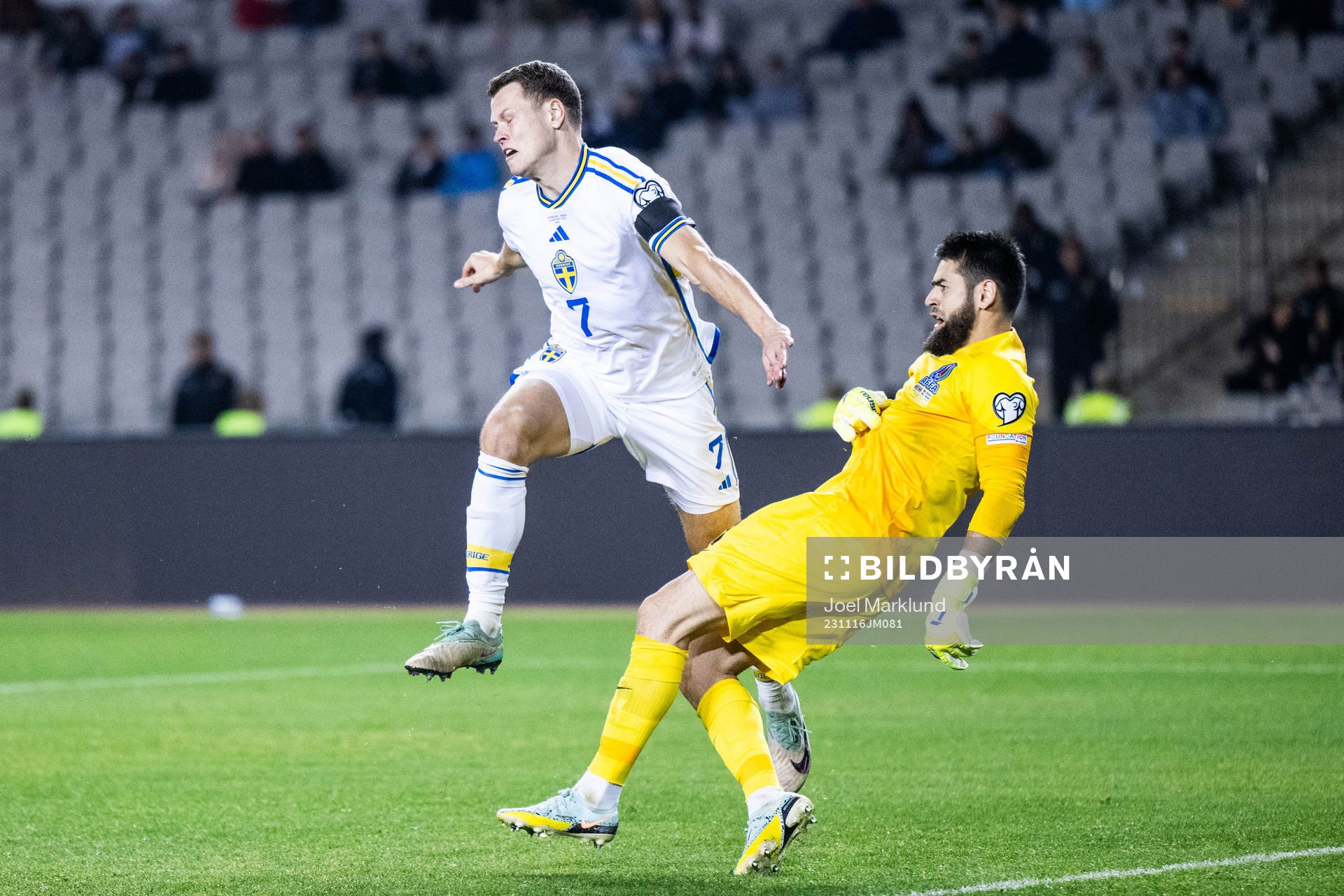 Viktor Claesson of Sweden and goalkeeper Shakhrudin
