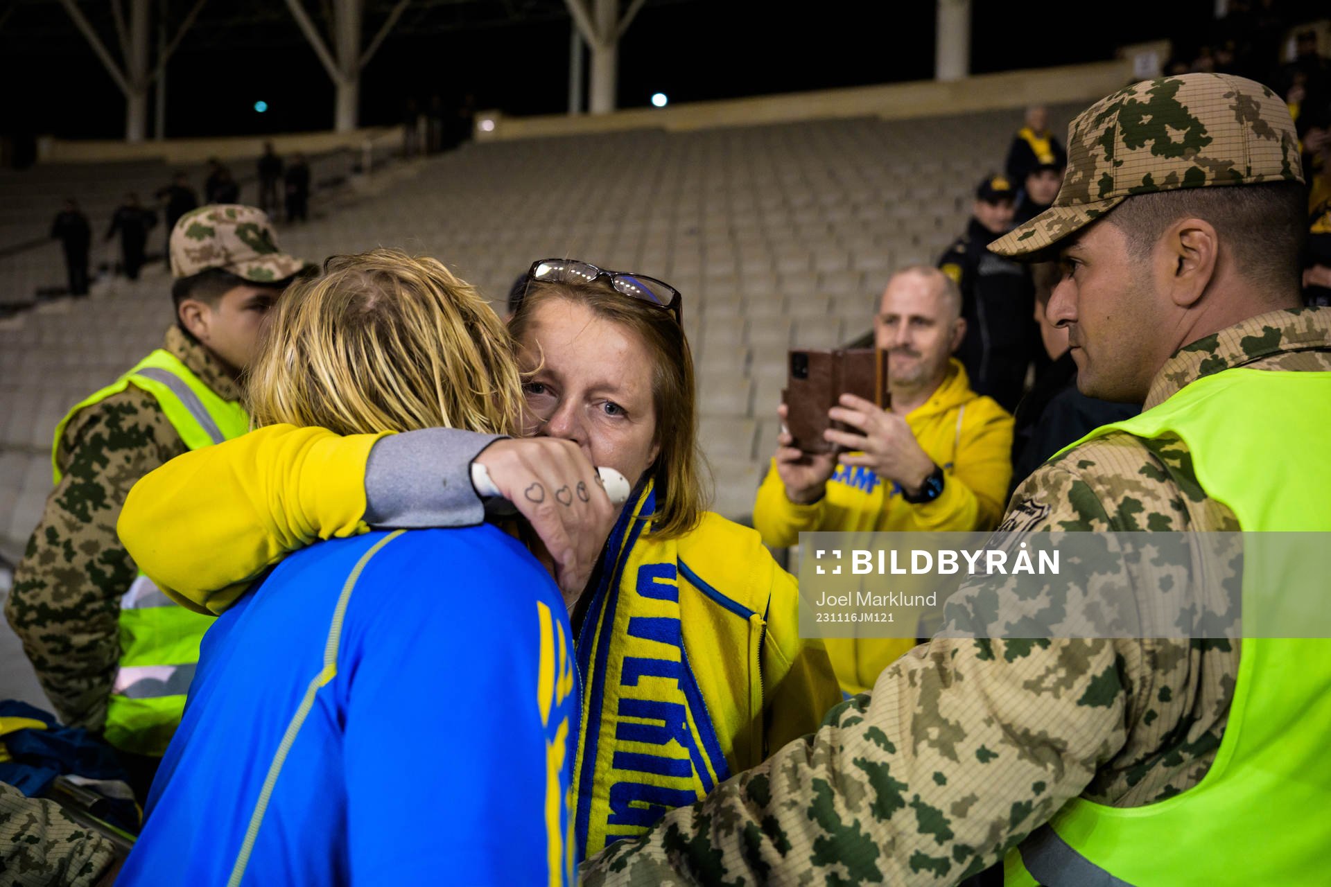 Emil Forsberg of Sweden hugs Swedish supporter Lisen Altis,