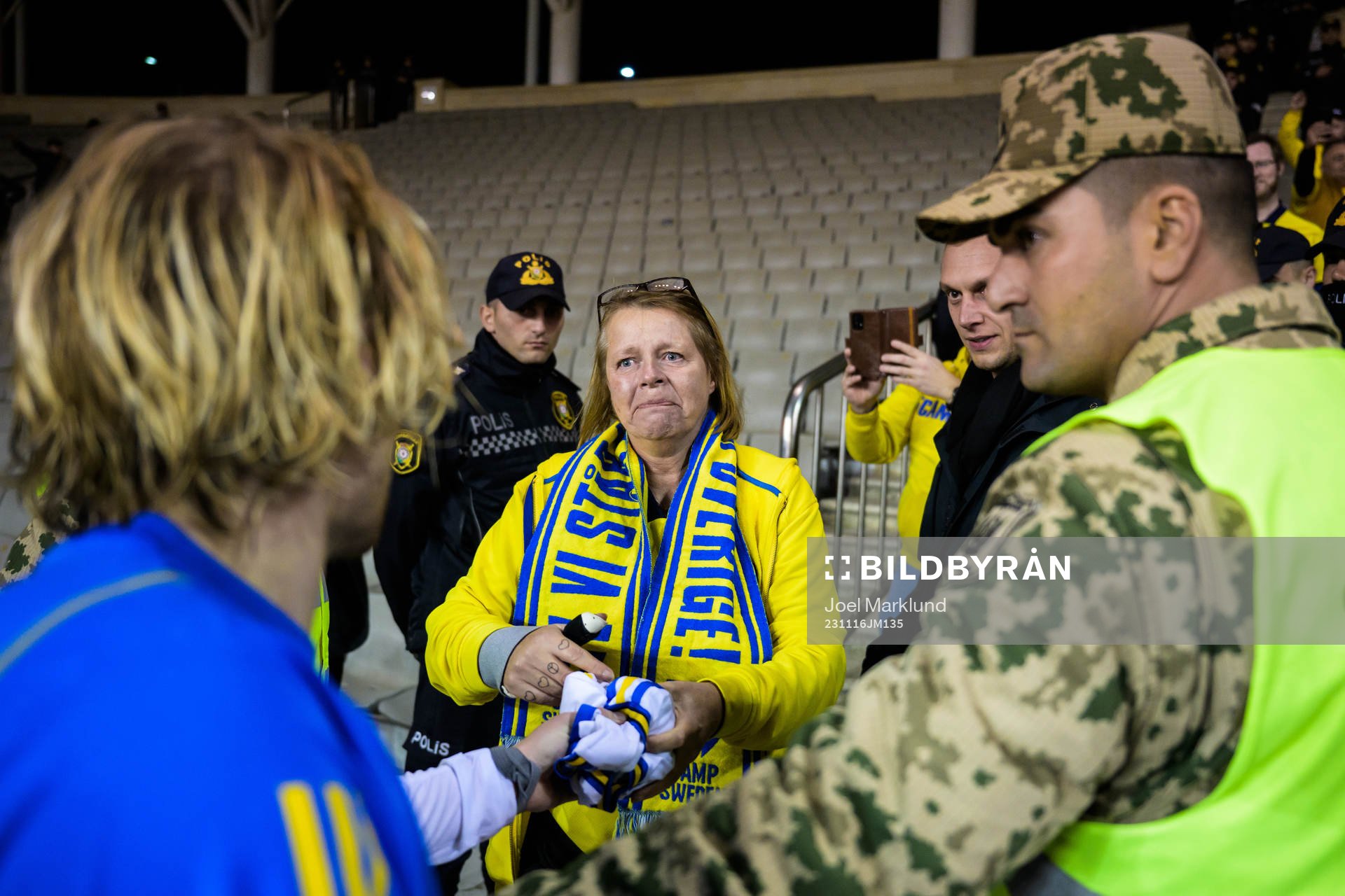 Emil Forsberg of Sweden hands over a jersey to Swedish