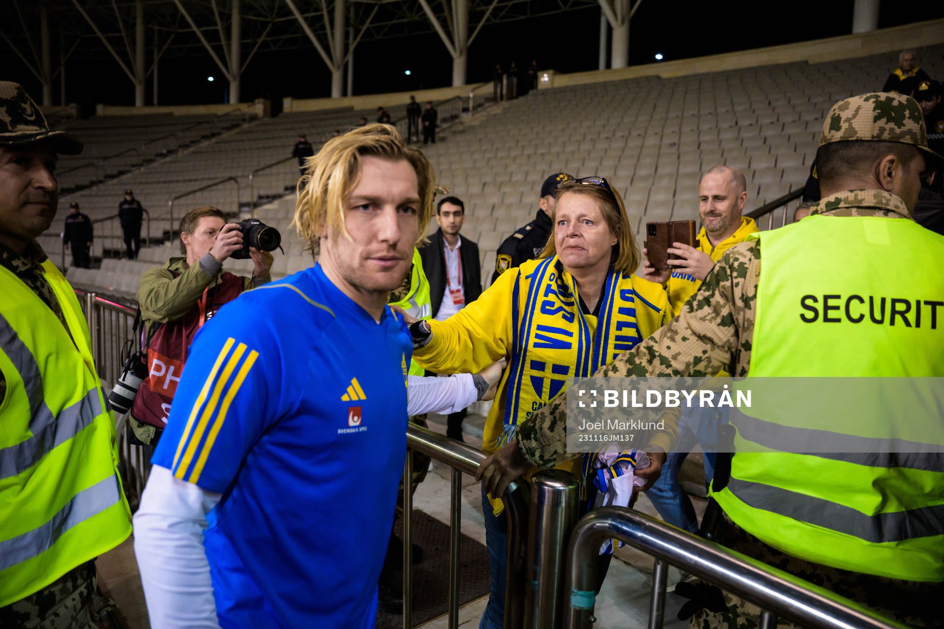 Emil Forsberg of Sweden hugs Swedish supporter Lisen Altis,