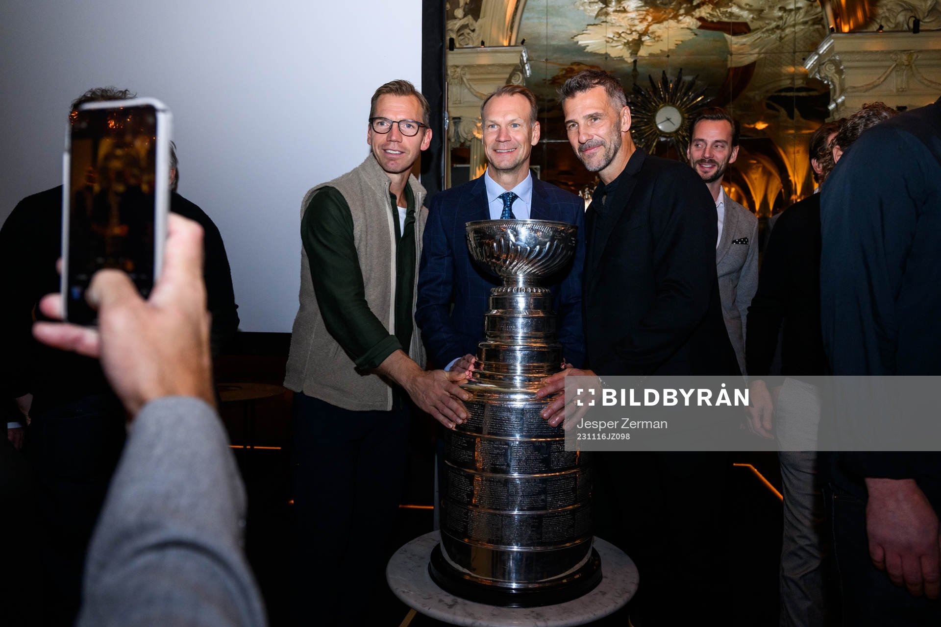 Nicklas Lidström pose for a photo with the Stanley Cup as