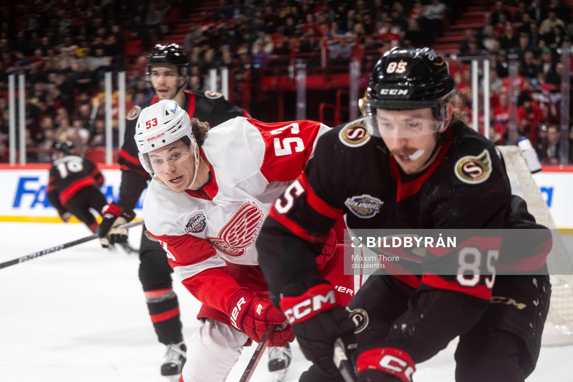 Moritz Seider of Detroit Red Wings and Jake Sanderson of
