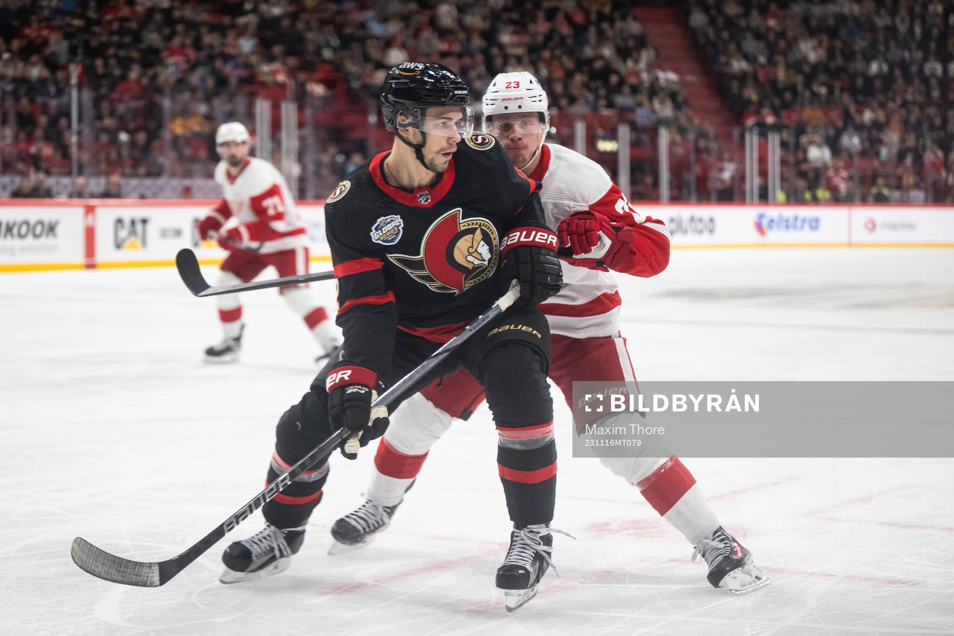 Artyom Zub of Ottawa Senators and Lucas Raymond of Detroit