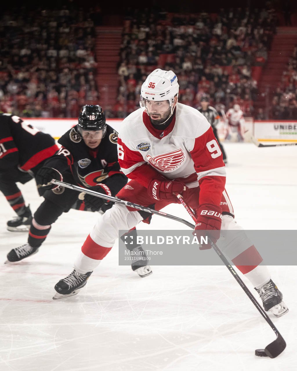 Tim Stützle of Ottawa Senators and Jake Walman of Detroit