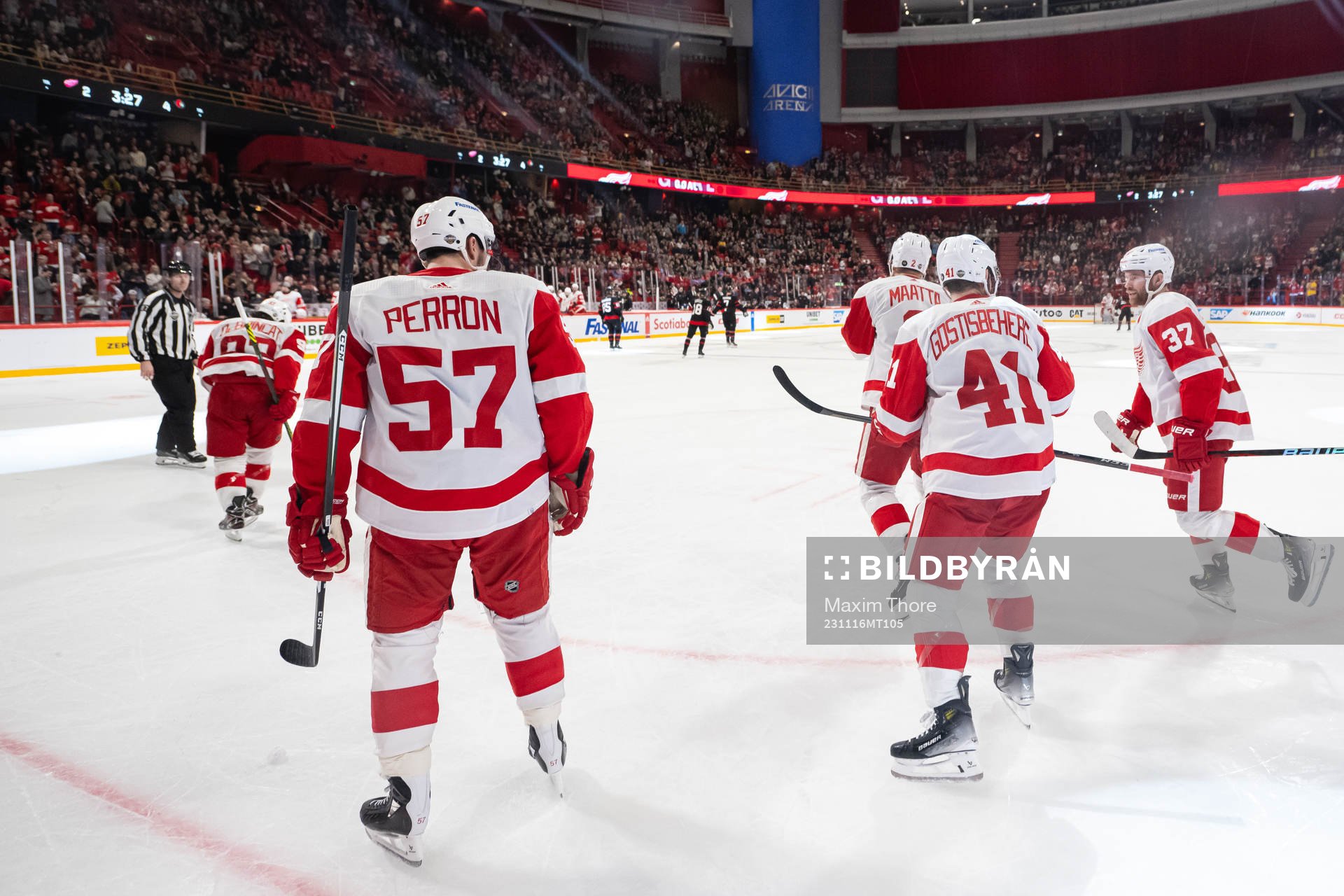 Alex DeBrincat of Detroit Red Wings celebrate with David