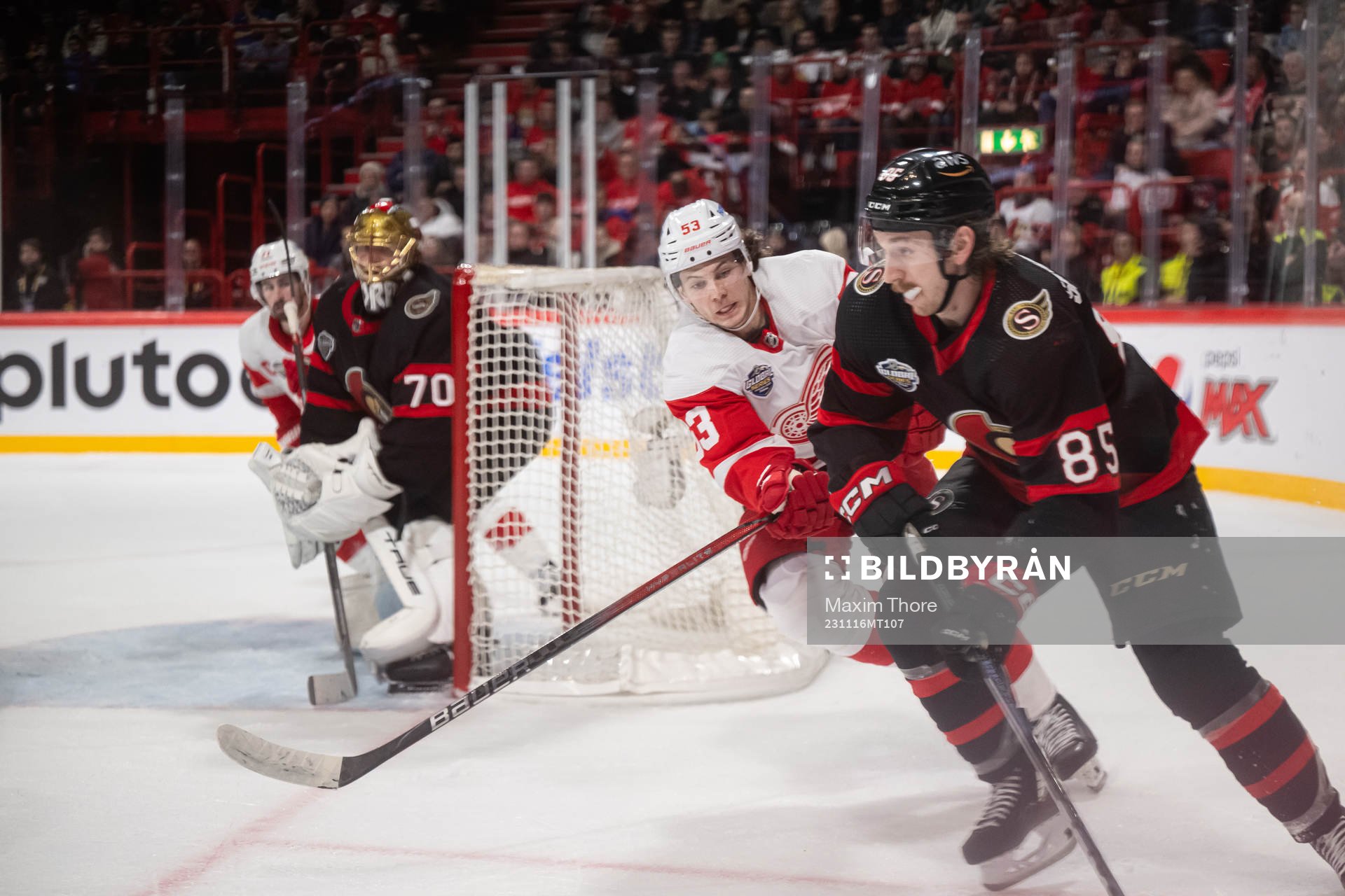 Moritz Seider of Detroit Red Wings and Jake Sanderson of