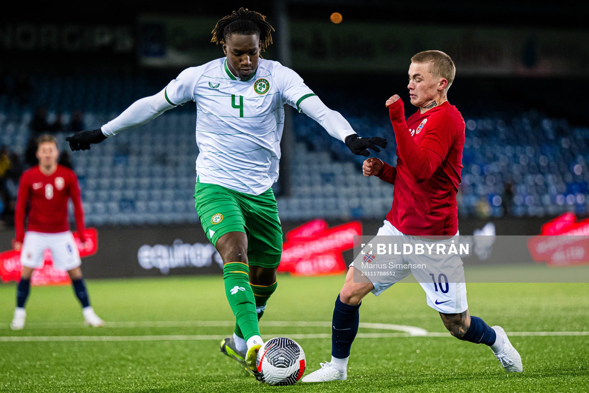 Mohammed Lawal of Ireland and Isak Hansen-Aarøen of Norway