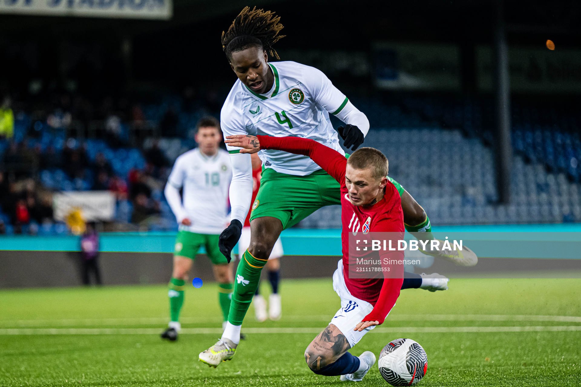Mohammed Lawal of Ireland and Isak Hansen-Aarøen of Norway