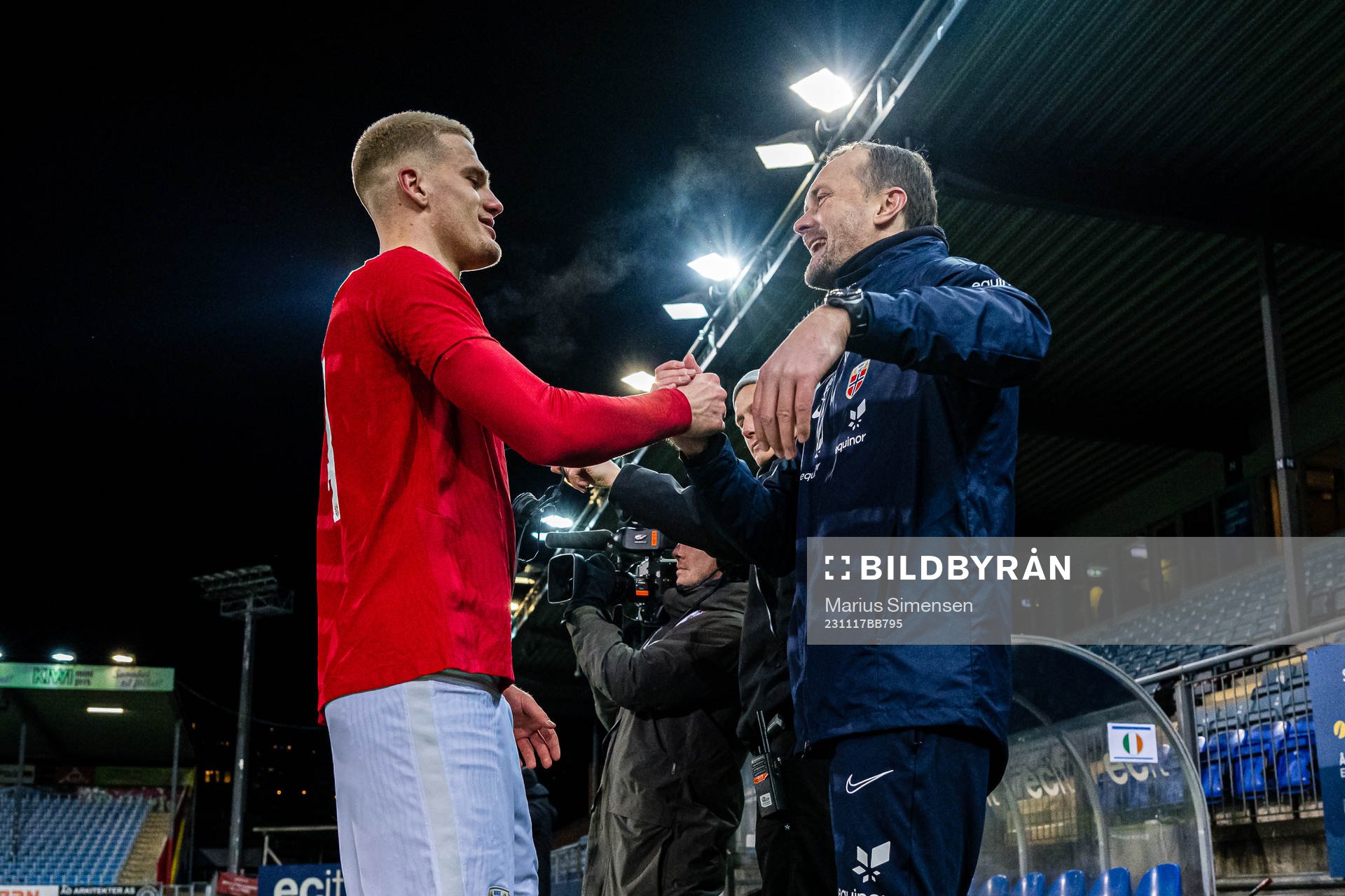 Leo Fuhr Hjelde and Jan Peder Jalland, head coach of Norway, celebrates after the UEFA European Under-21 Qualifier football match between Norway and Ireland on November 17, 2023 in Drammen.