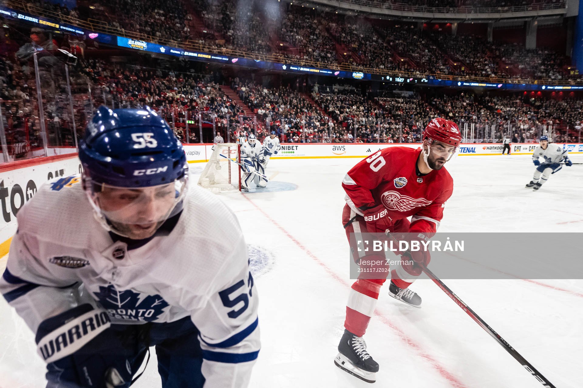 Mark Giordano of Toronto Maple Leafs and Joe Veleno of