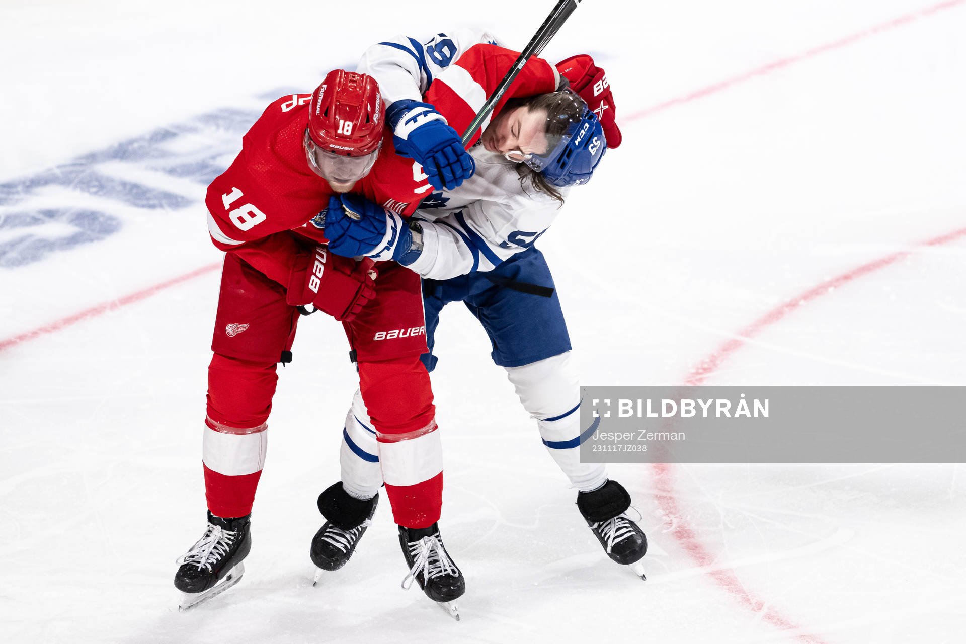 Andrew Copp of Detroit Red Wings and Tyler Bertuzzi of