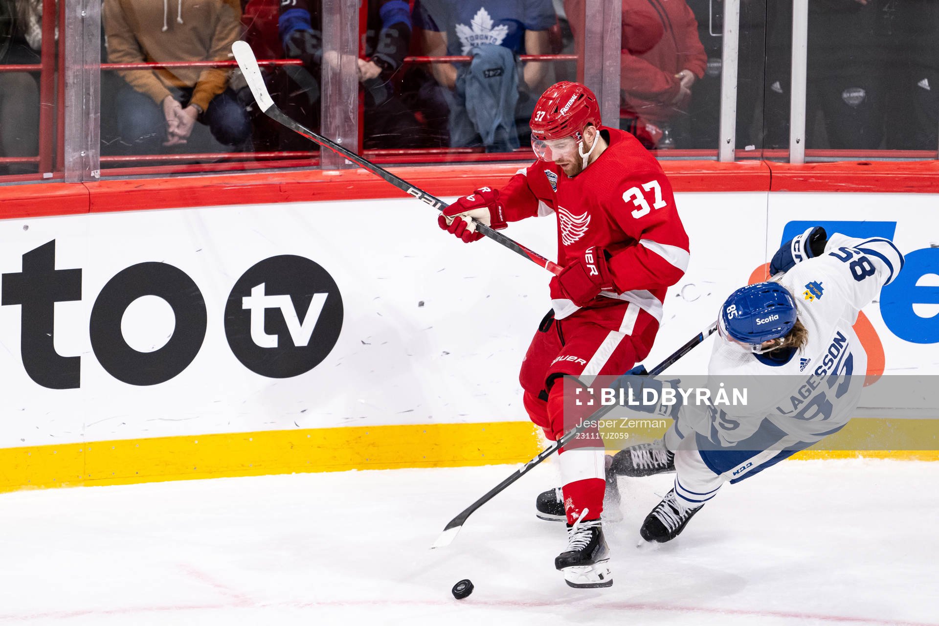 J.T. Compher of Detroit Red Wings and William Lagesson of