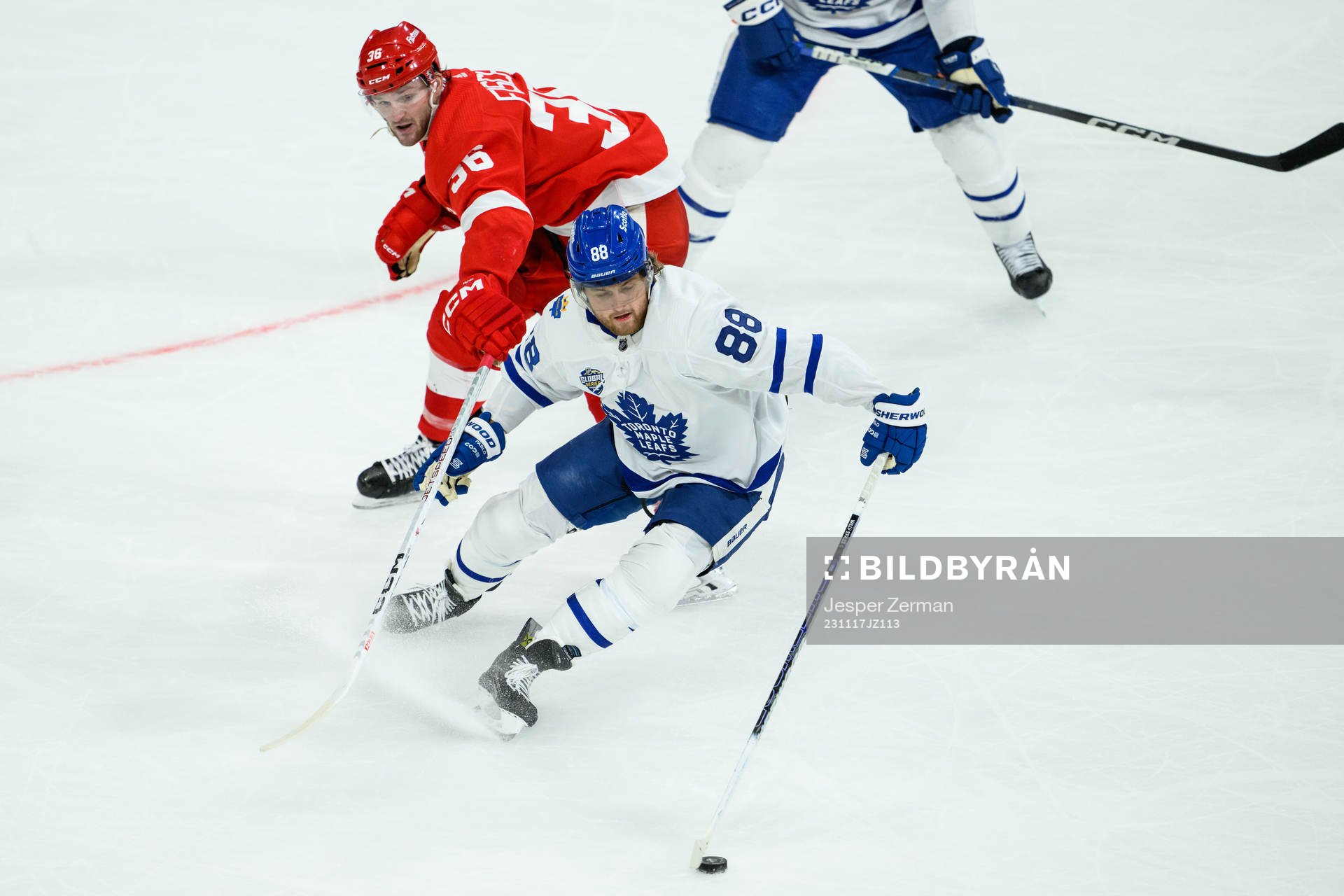 Christian Fischer of Detroit Red Wings and William Nylander