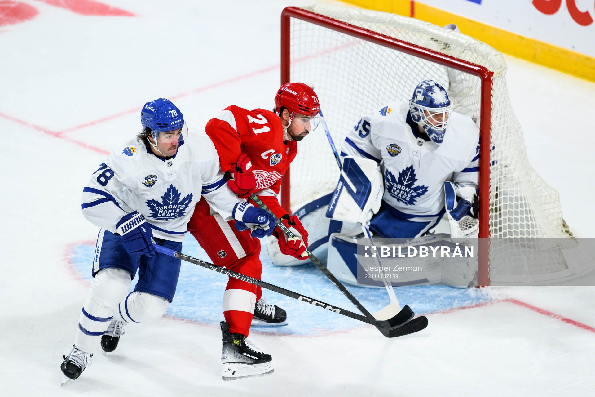 TJ Brodie and goalkeeper Ilya Samsonov of Toronto Maple