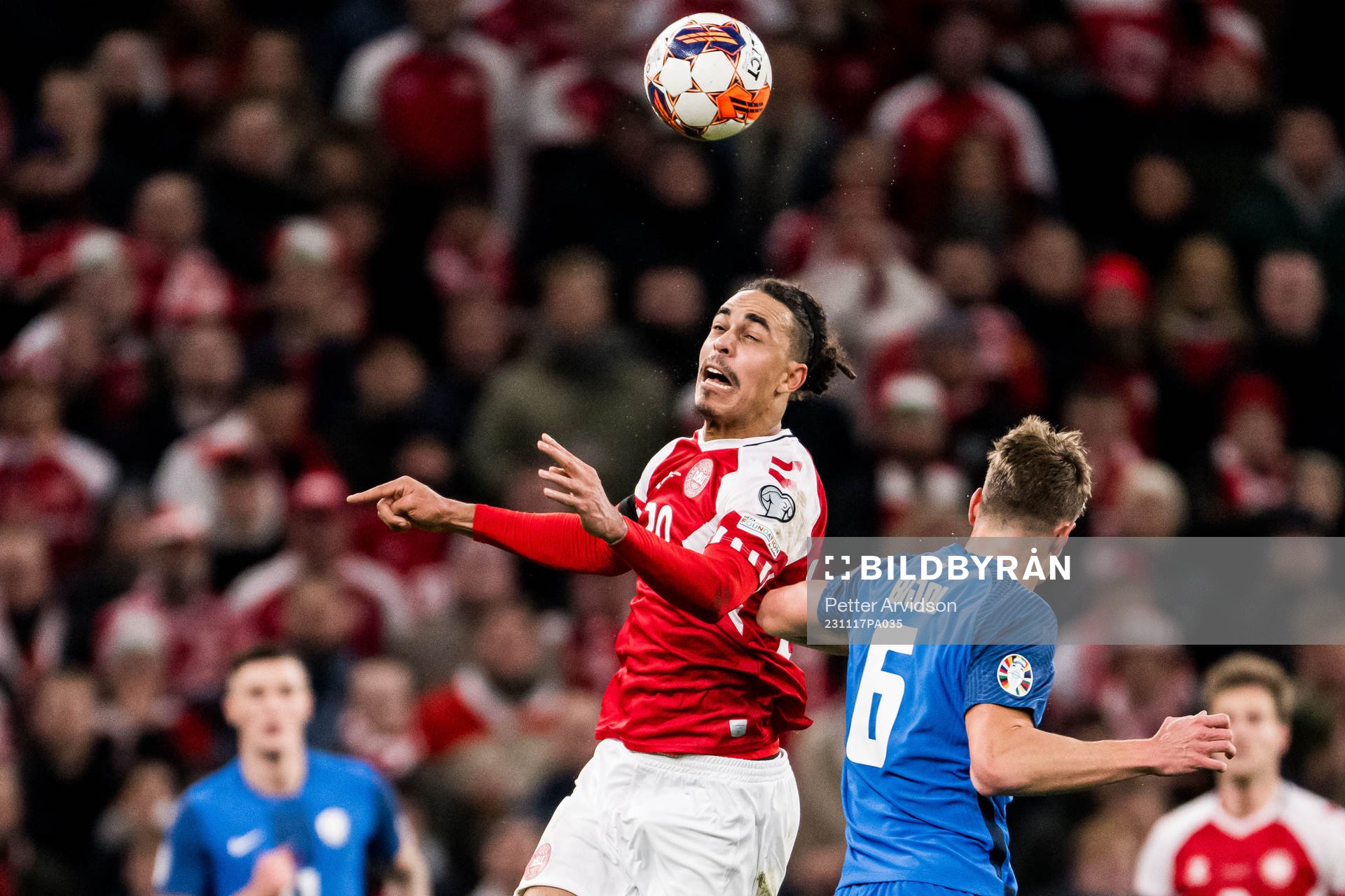 Yussuf Poulsen of Denmark and Jaka Bijol of Slovenia