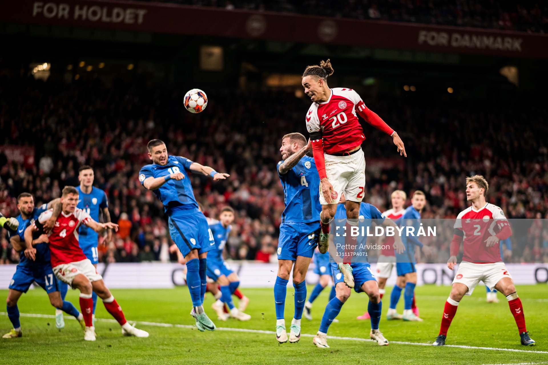 Yussuf Poulsen of Denmark and Miha Blazic of Slovenia