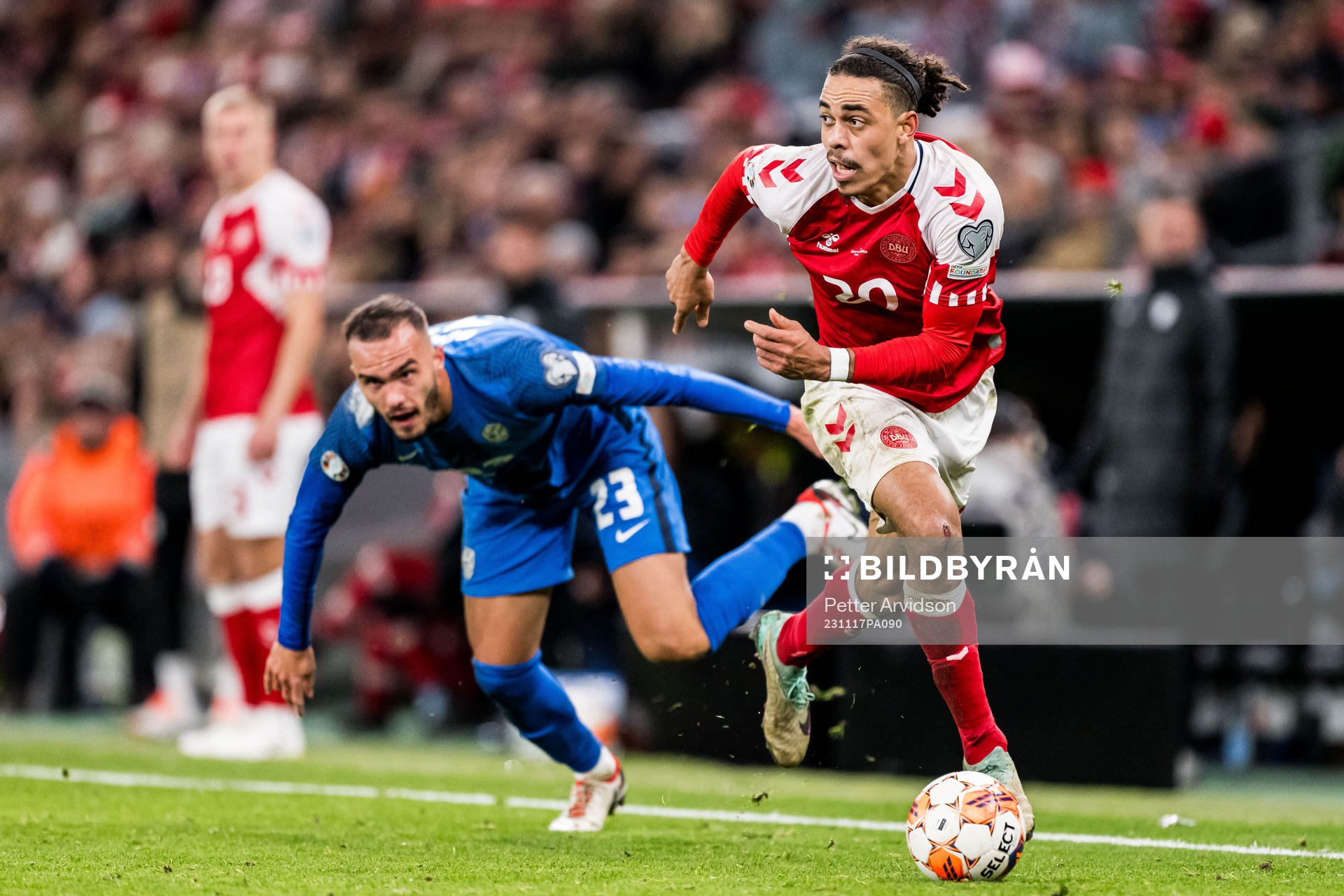 Yussuf Poulsen of Denmark and Vanja Drkusic of Slovenia