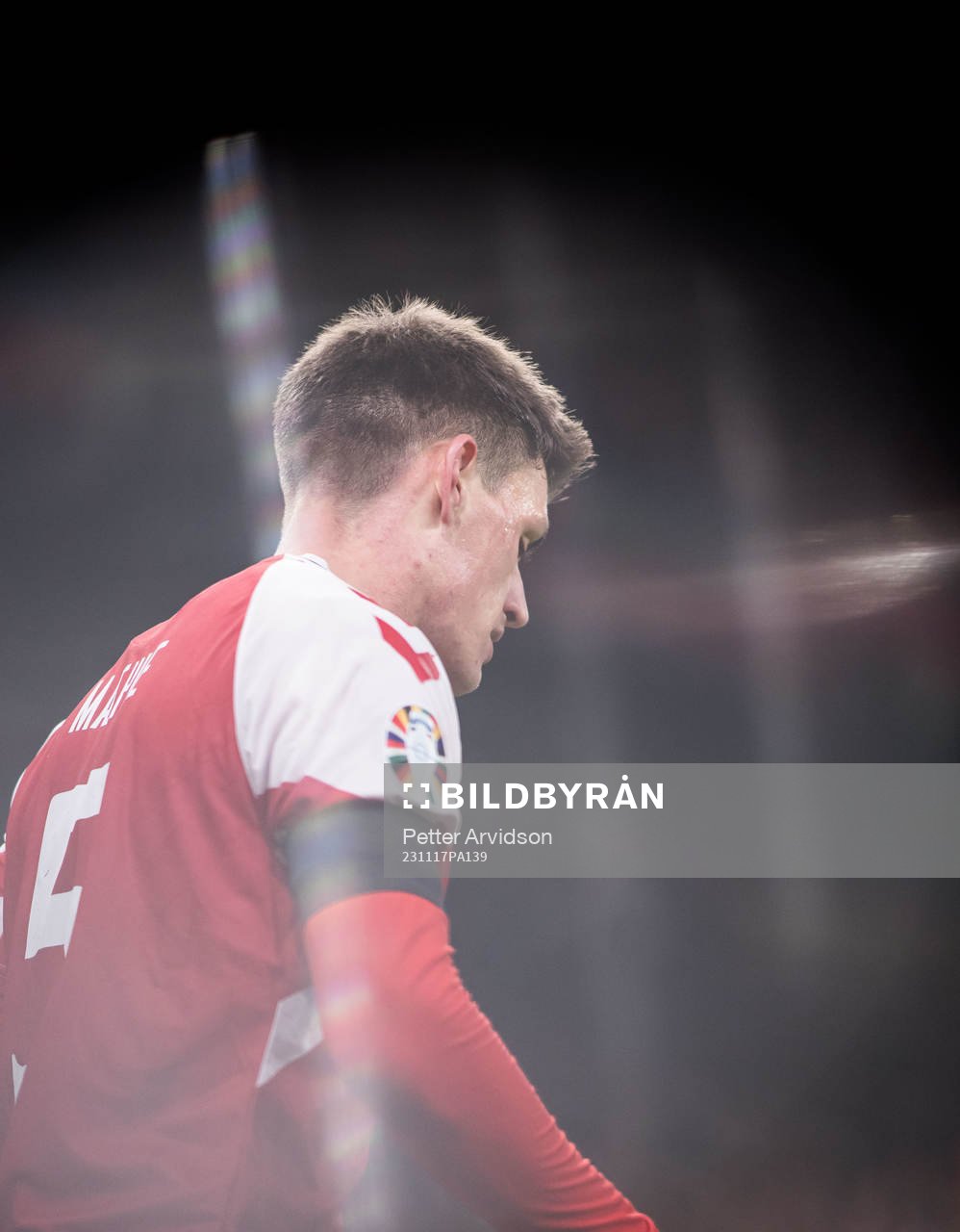 Joakim Mæhle of Denmark looks dejected