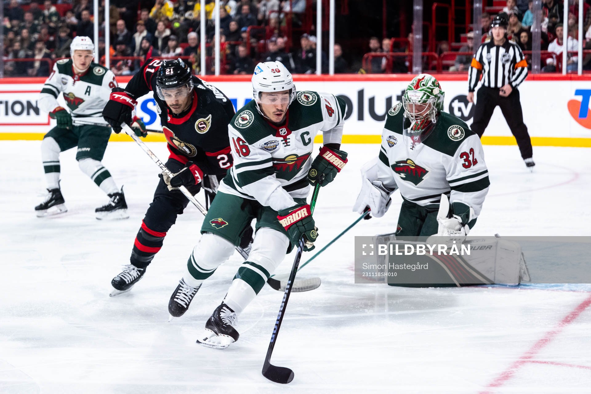 Jared Spurgeon of Minnesota Wild and Mathieu Joseph of