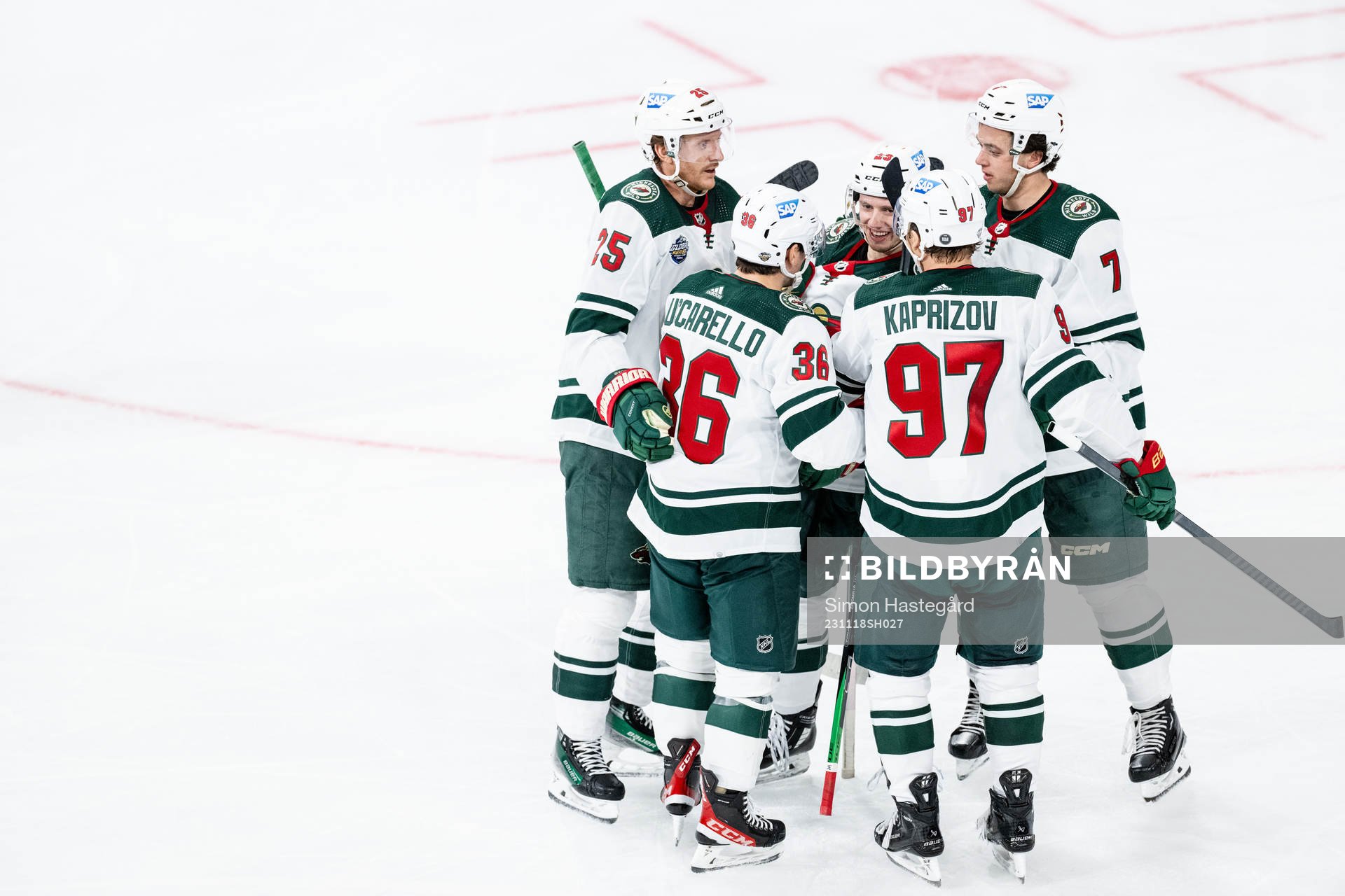 Marco Rossi of Minnesota Wild celebrates with teammates