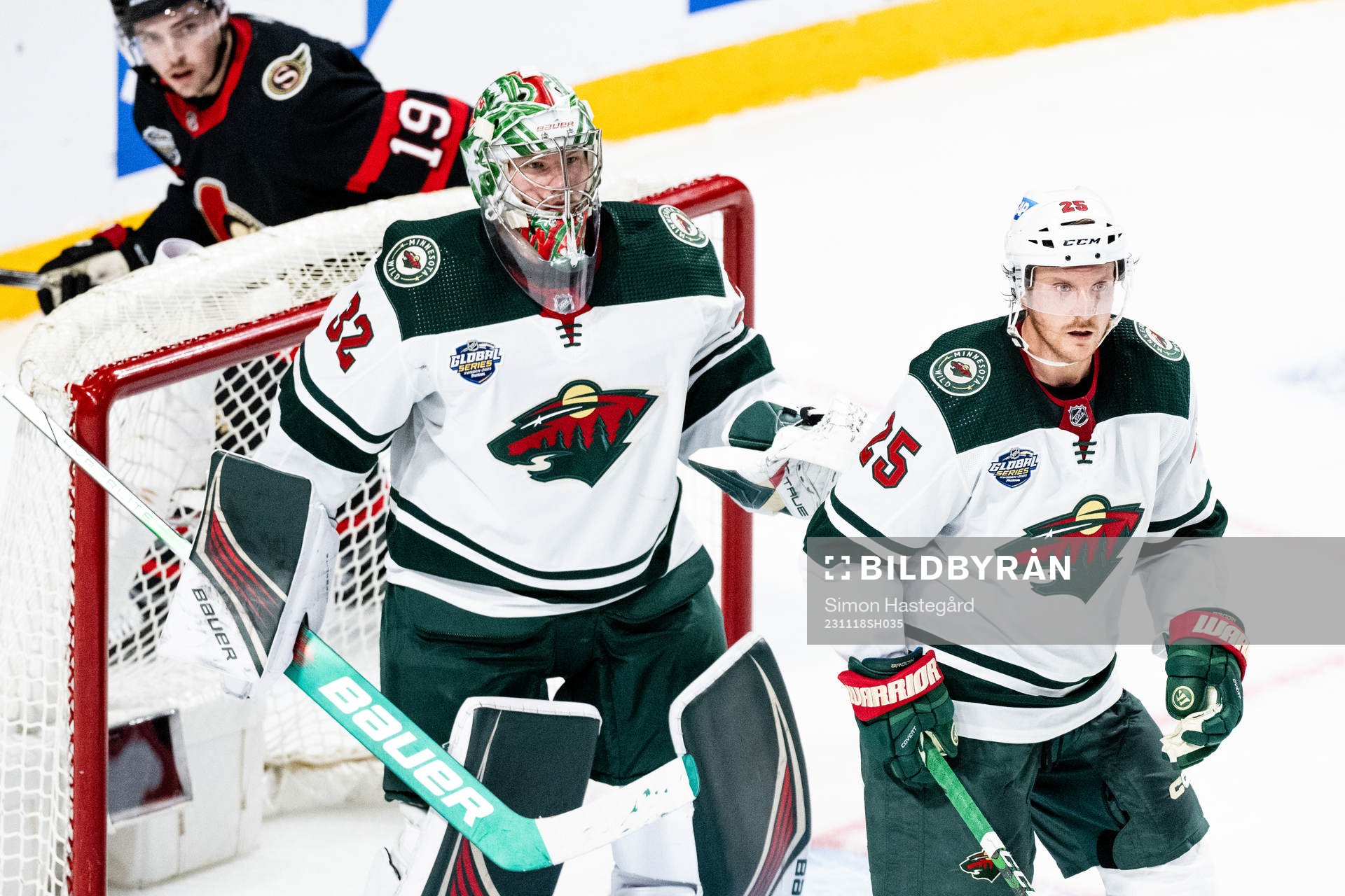 Goaltender Filip Gustavsson and Jonas Brodin of Minnesota