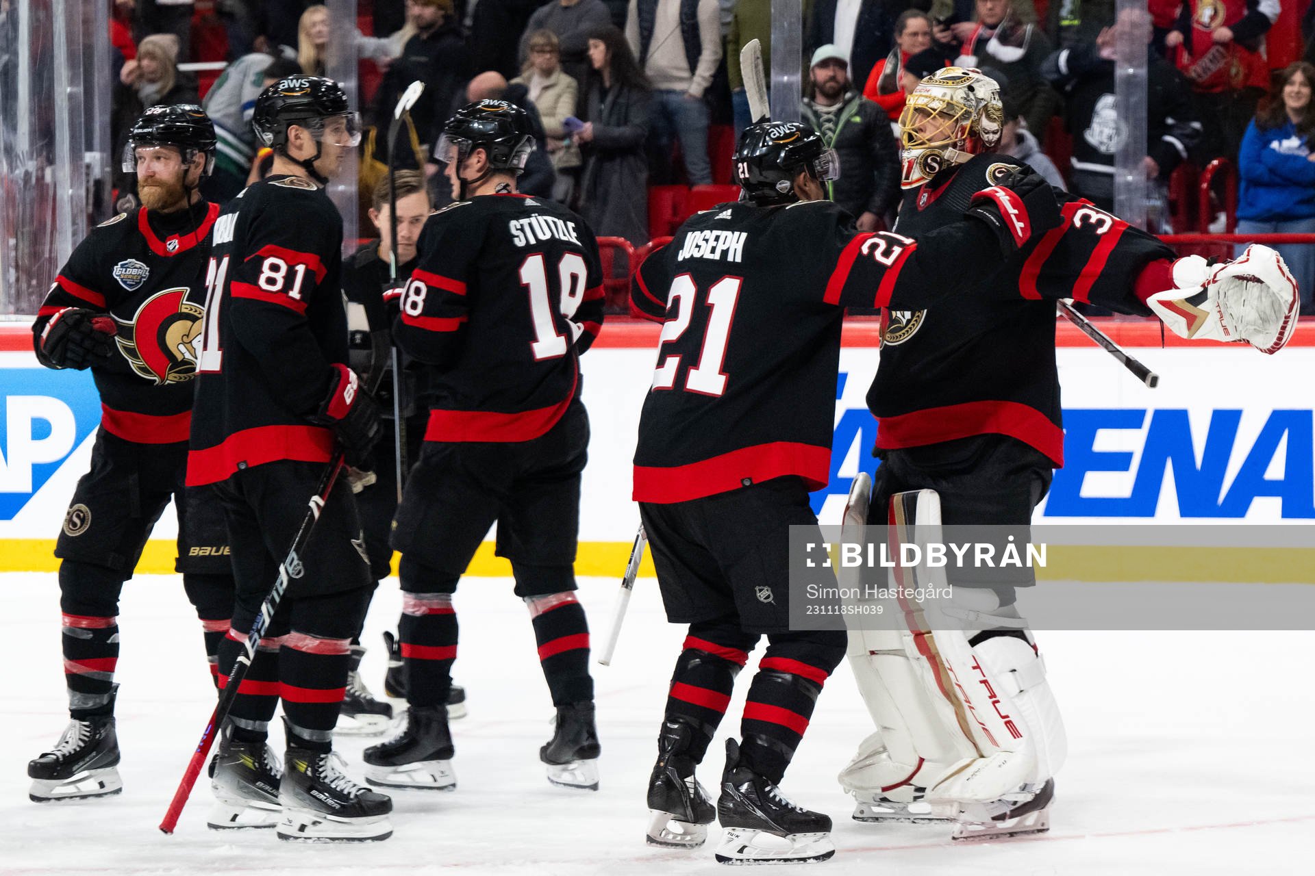 Mathieu Joseph of Ottawa Senators and goaltender Anton