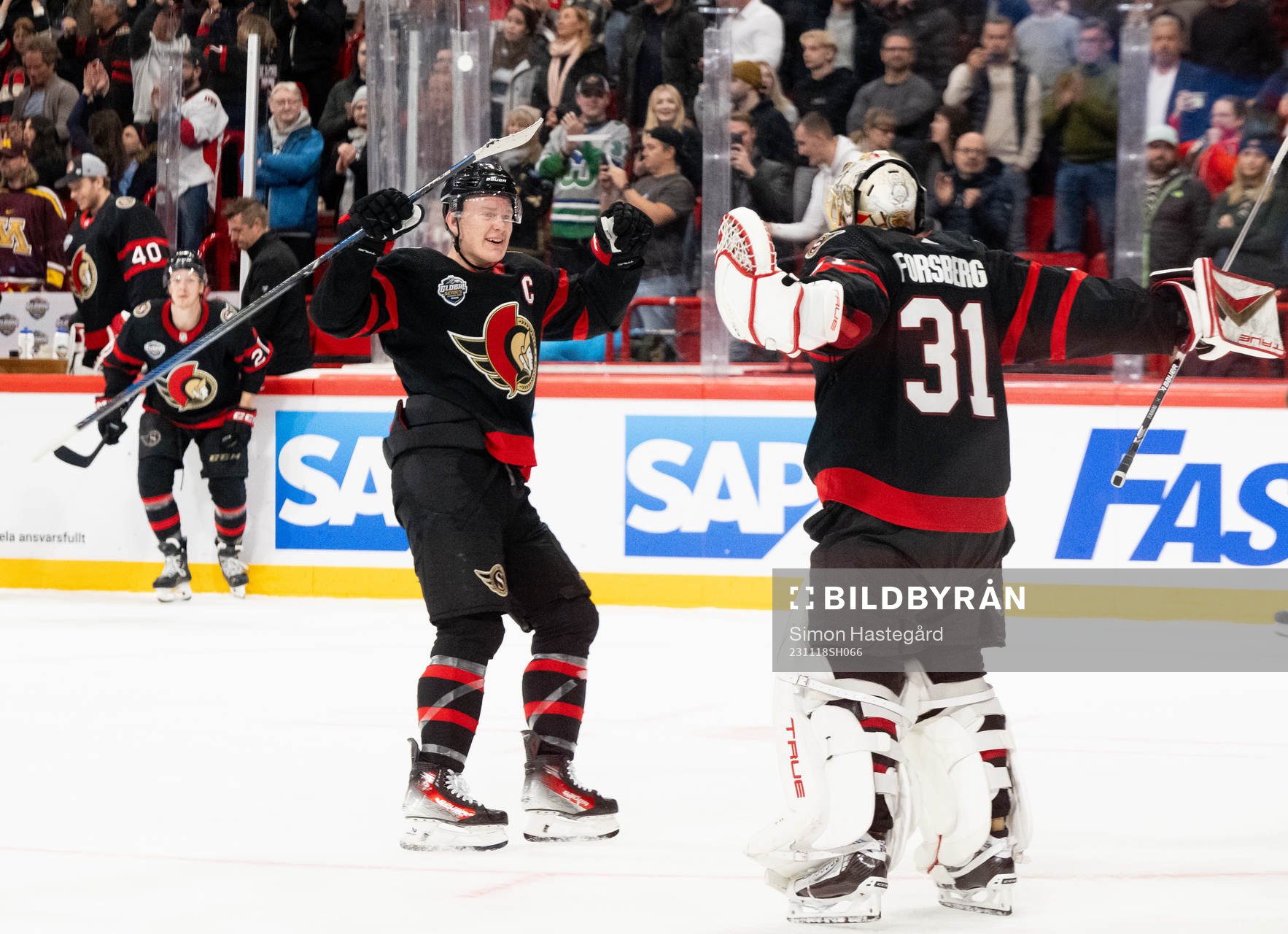 Brady Tkachuk and goaltender Anton Forsberg of Ottawa