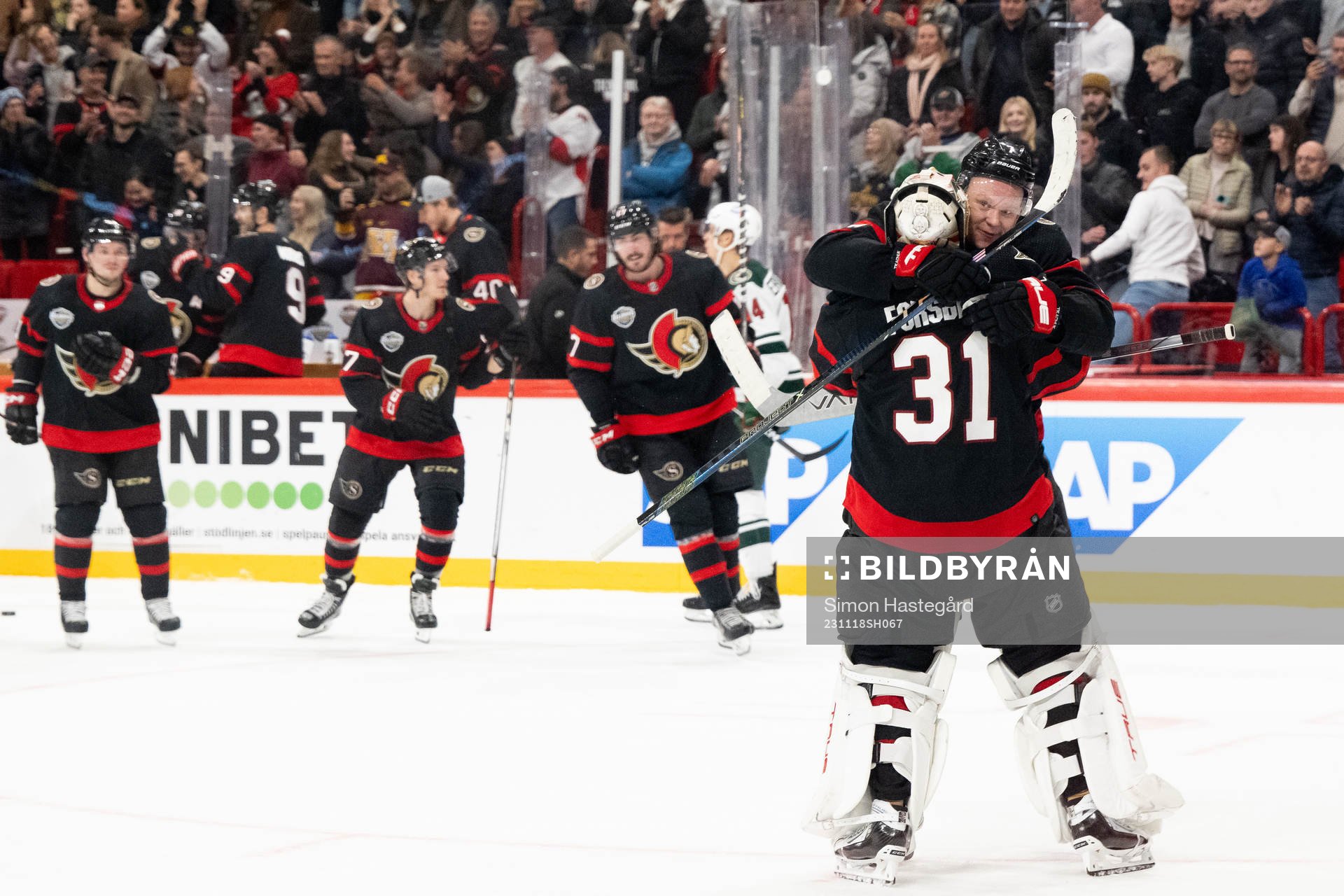 Brady Tkachuk and goaltender Anton Forsberg of Ottawa