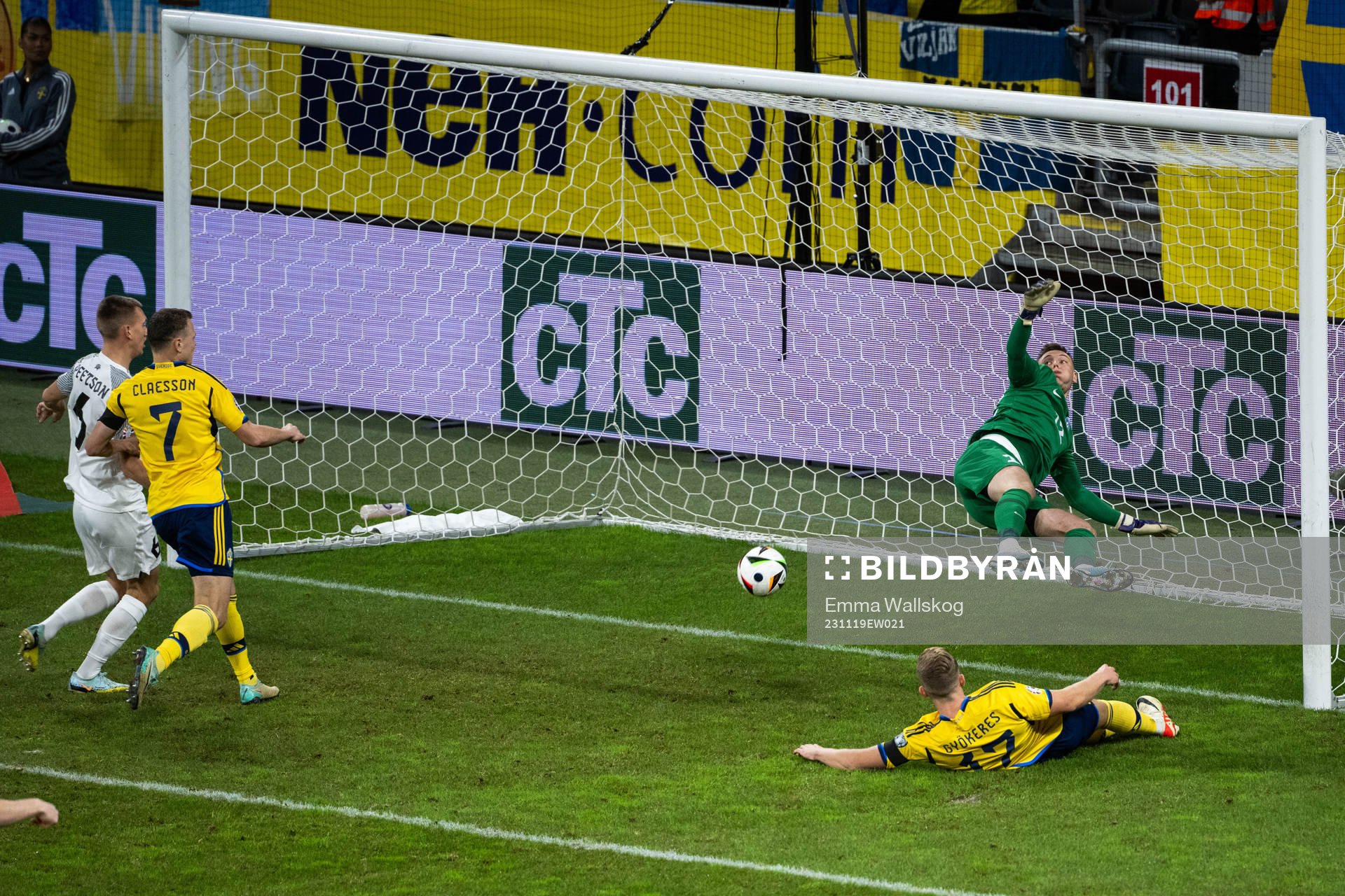 Viktor Claesson of Sweden and goalkeeper Karl Jakob Hein of