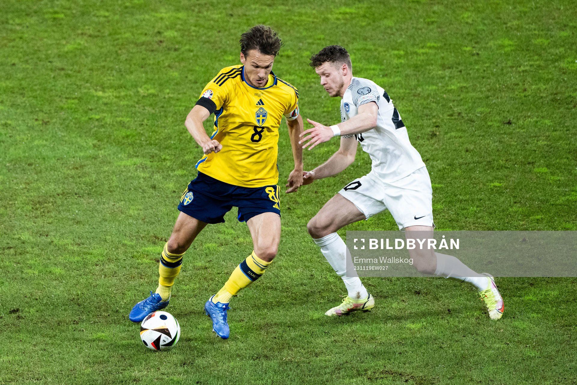 Albin Ekdal of Sweden and Markus Poom of Estonia