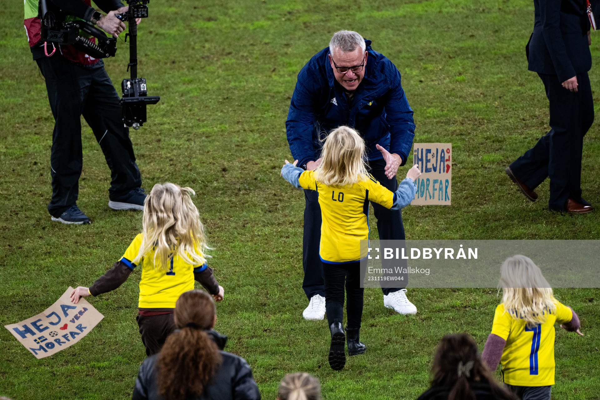 Head coach Janne Andersson of Sweden with his grandchild