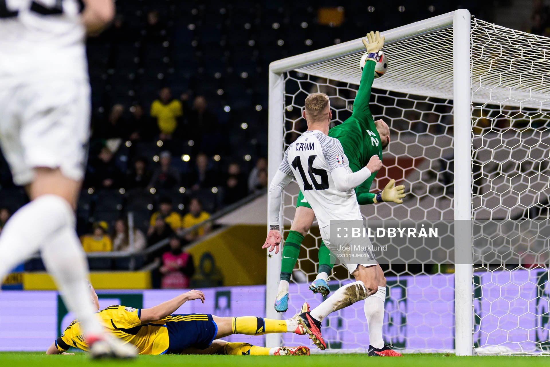 Viktor Gyökeres of Sweden against goalkeeper Karl Jakob