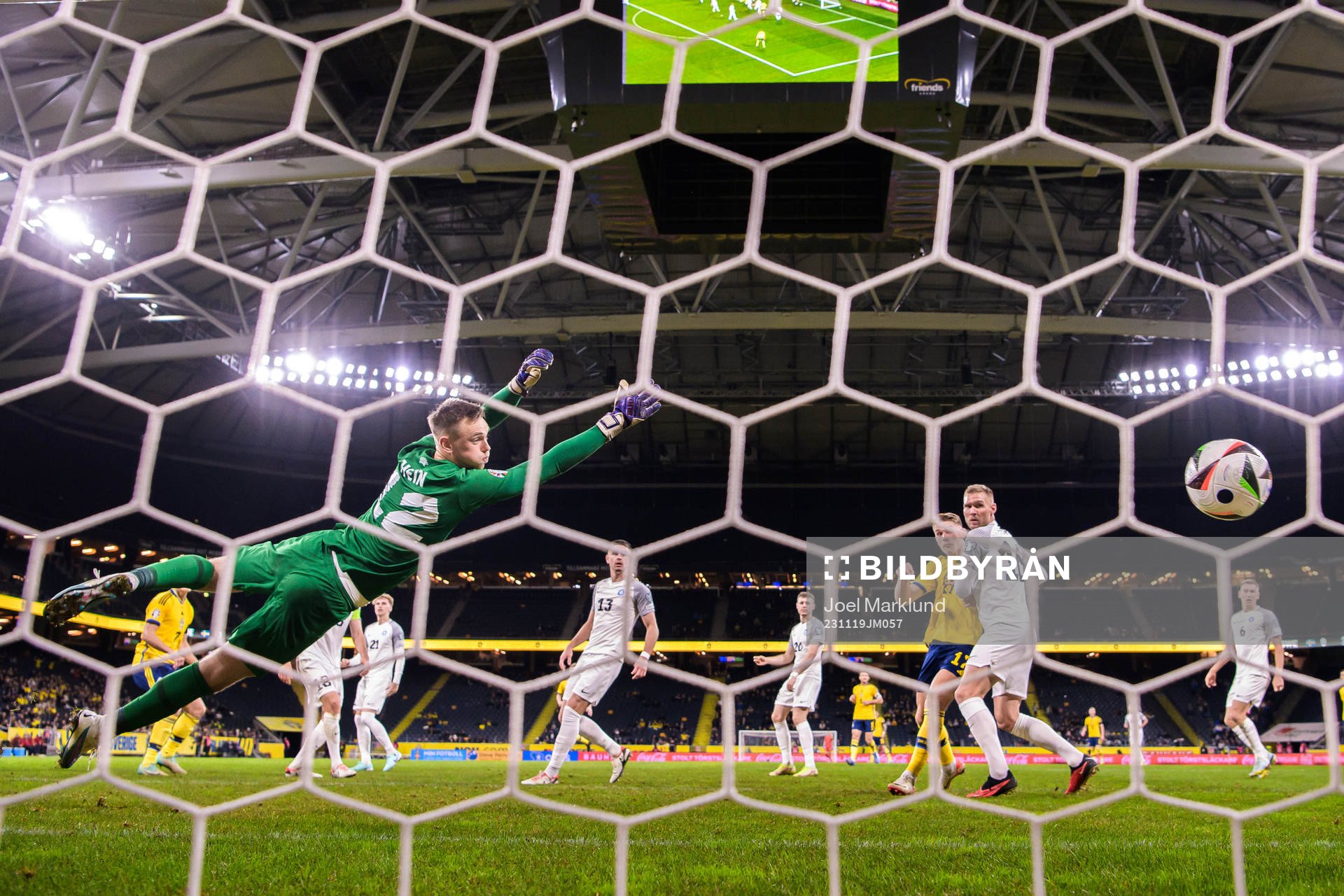 Viktor Claesson of Sweden scores the 1-0 goal behind
