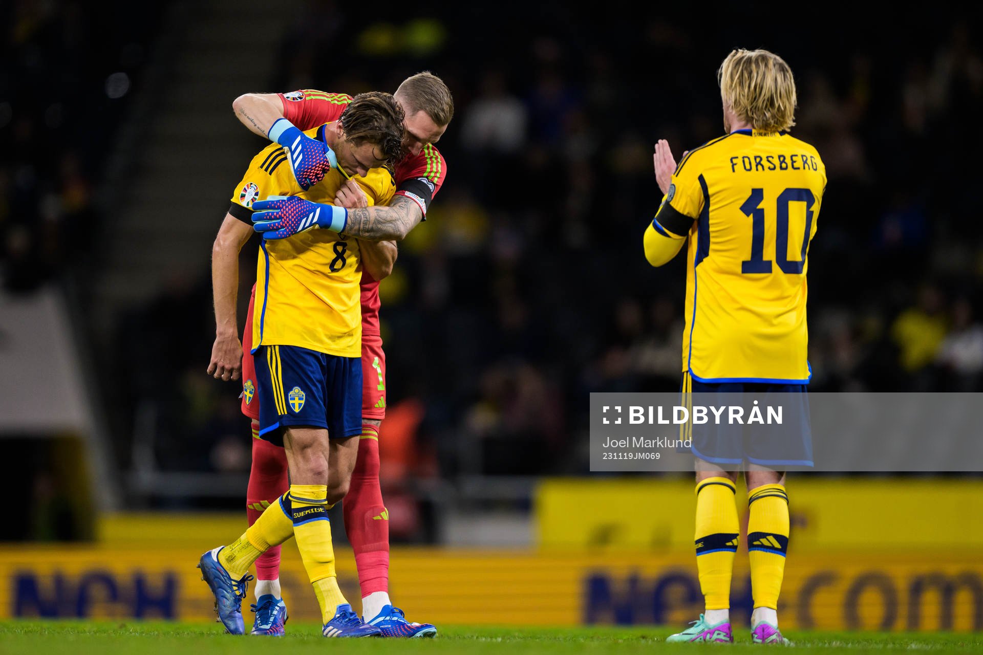 Albin Ekdal and goalkeeper Robin Olsen of Sweden