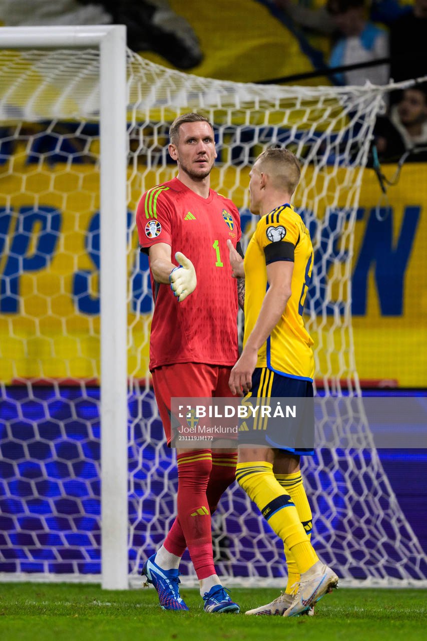 Goalkeeper Robin Olsen and Ludwig Augustinsson of Sweden