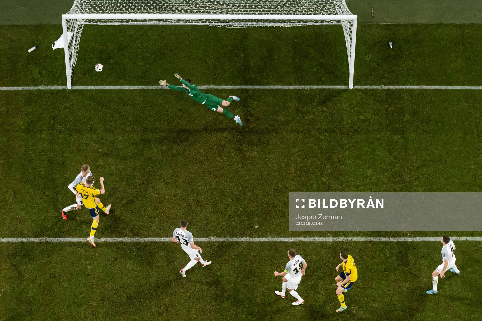 Viktor Claesson of Sweden scores the 1-0 goal behind