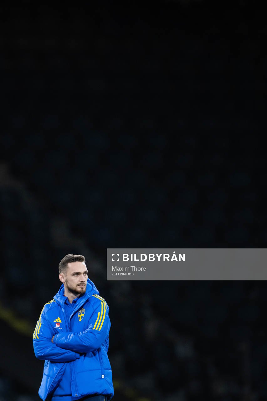 Linus Wahlqvist Egnell of Sweden inspect the pitch