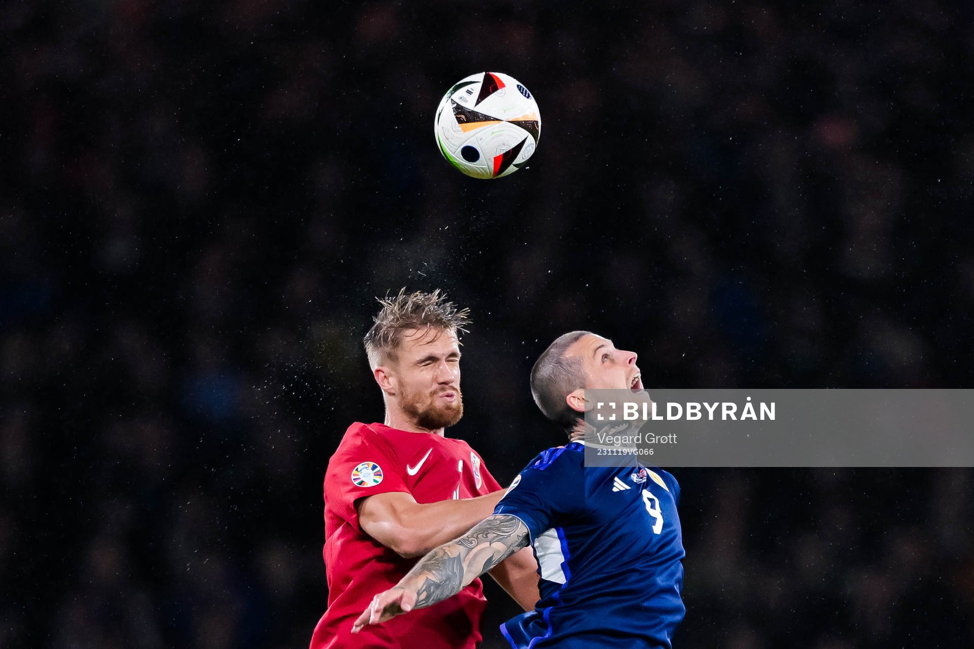Kristoffer Ajer of Norway and Lyndon Dykes of Scotland