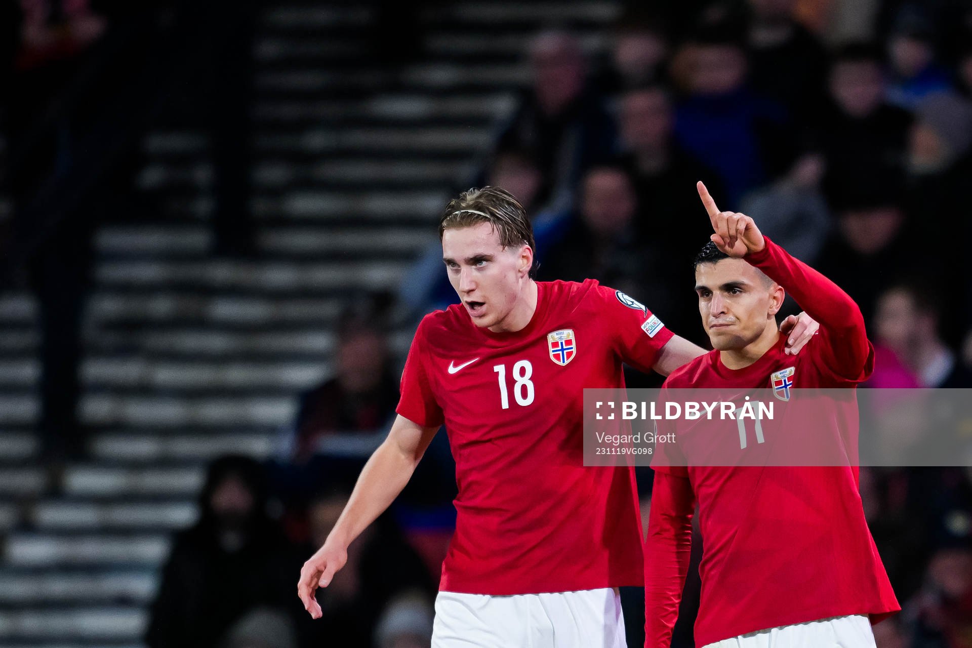 Mohamed Elyounoussi of Norway celebrates with teammate Kristian Thorstvedt after scoring 3-3 during the UEFA Euro Qualifier football match between Scotland and Norway on November 19, 2023 in Glasgow.